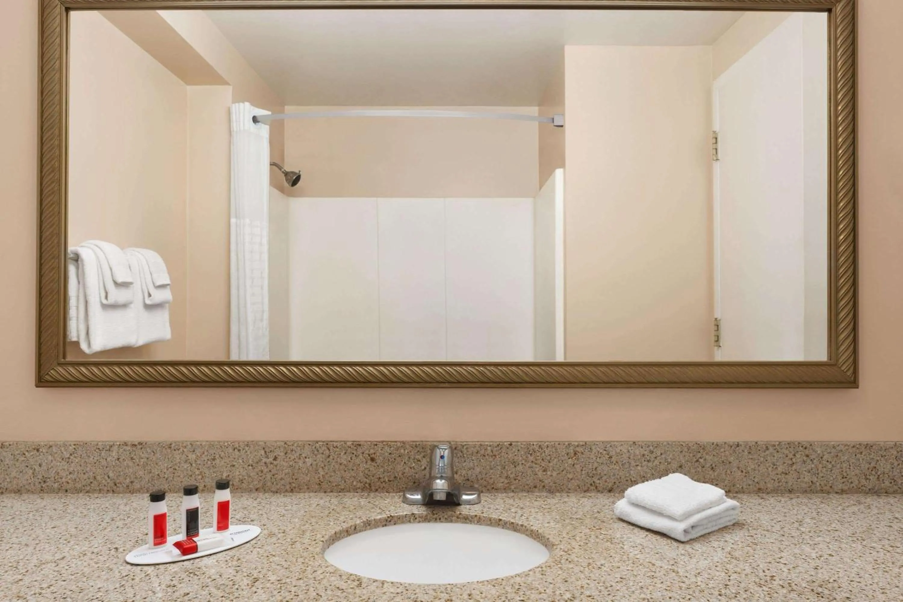 Bathroom in Days Inn by Wyndham Middletown/Newport Area