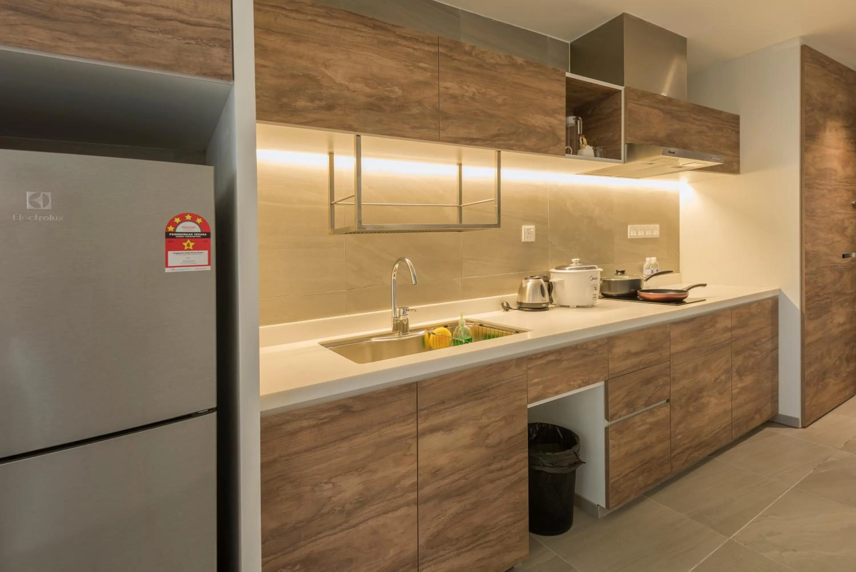 Kitchen or kitchenette in Jinhold Hotel & Serviced Apartment