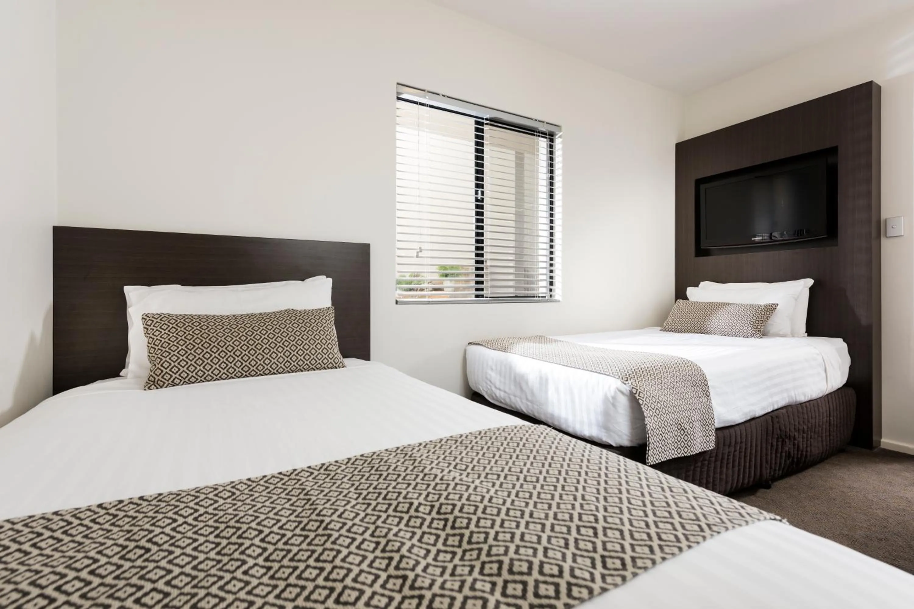 Bedroom, Bed in Pier 21 Riverside Apartment Hotel