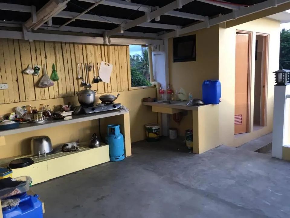 Communal kitchen in Mayon Lodging House