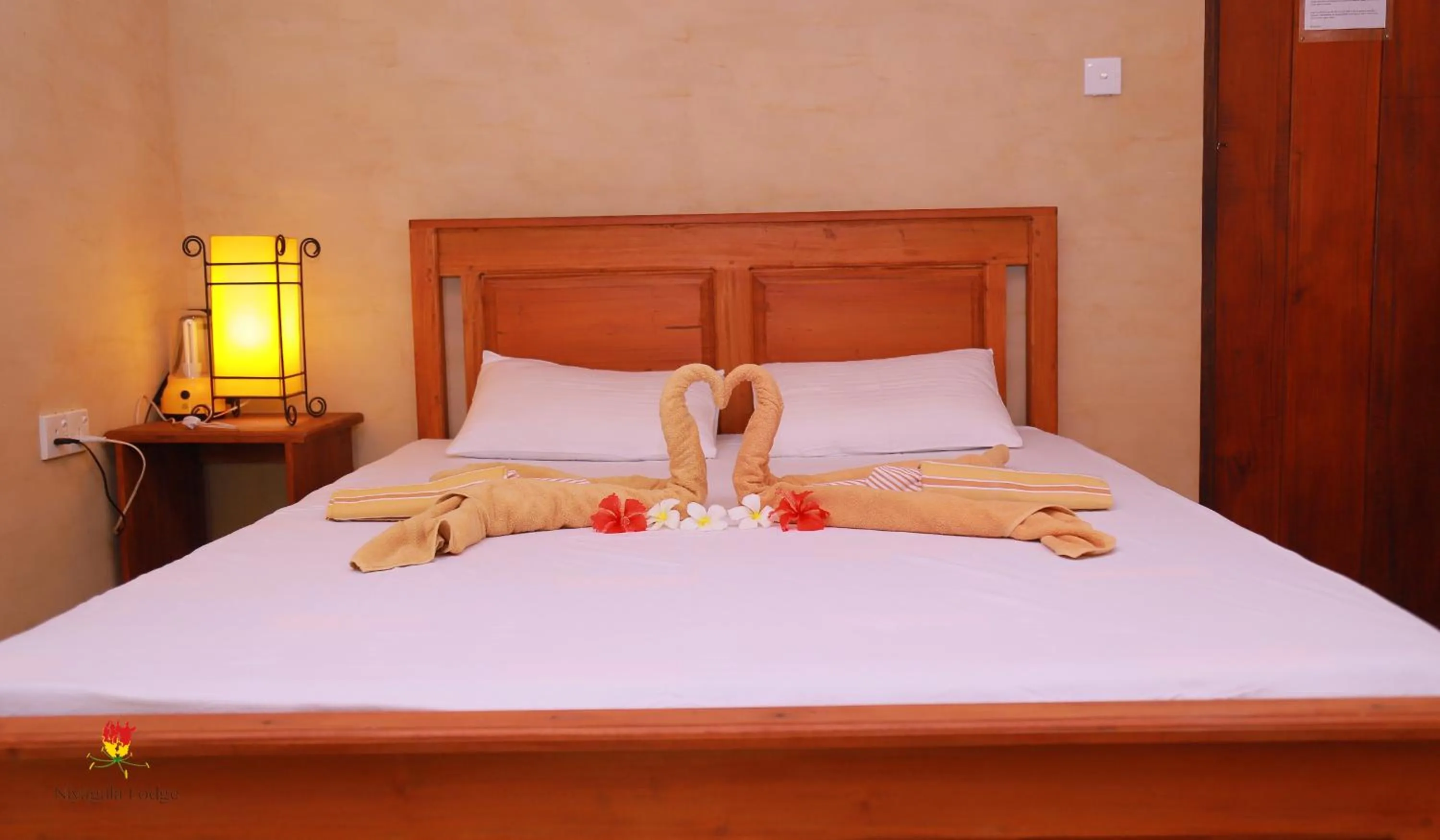 Bed in Hotel Niyagala Lodge Sigiriya