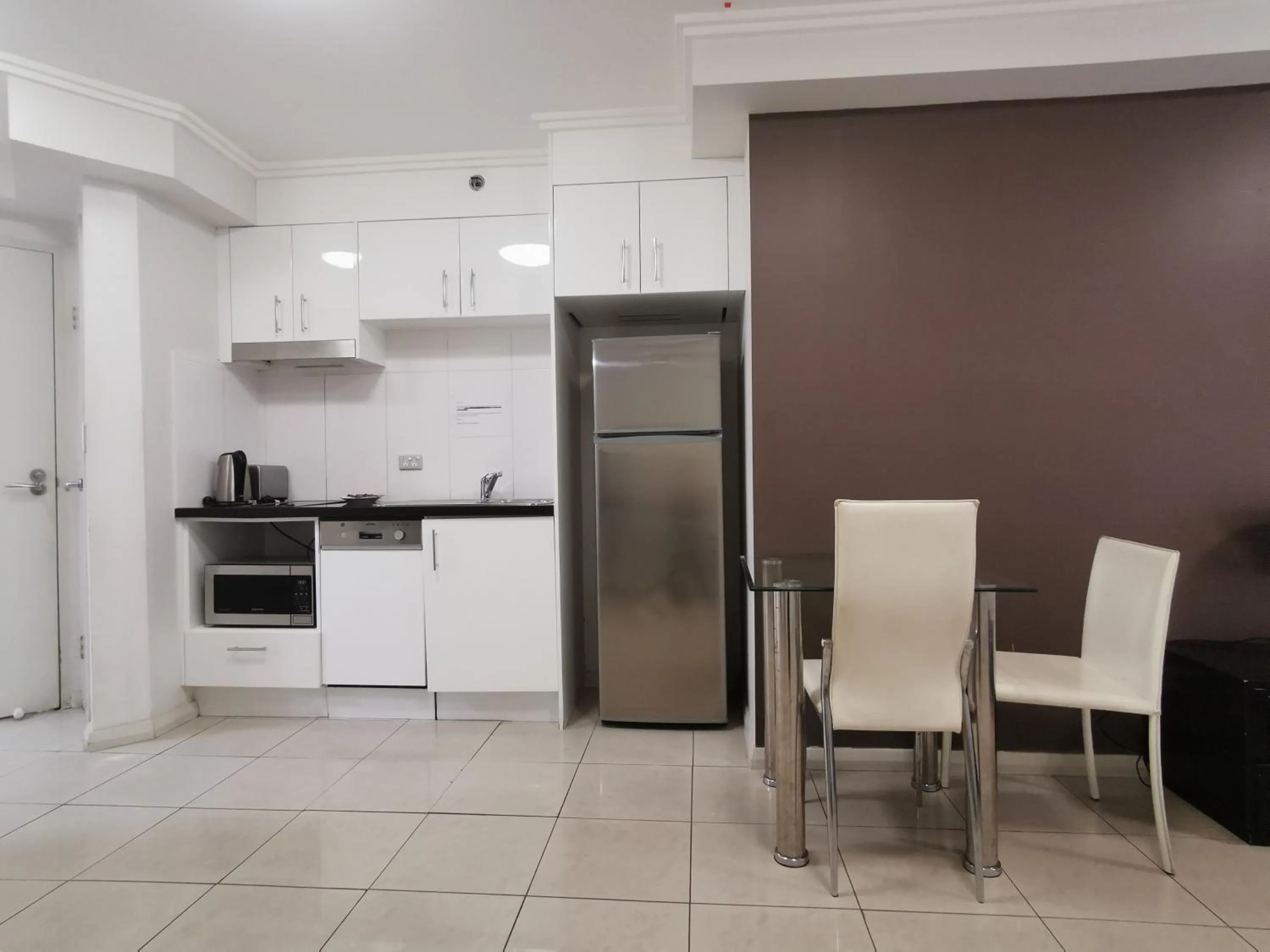 Kitchen or kitchenette in Fiori Apartments