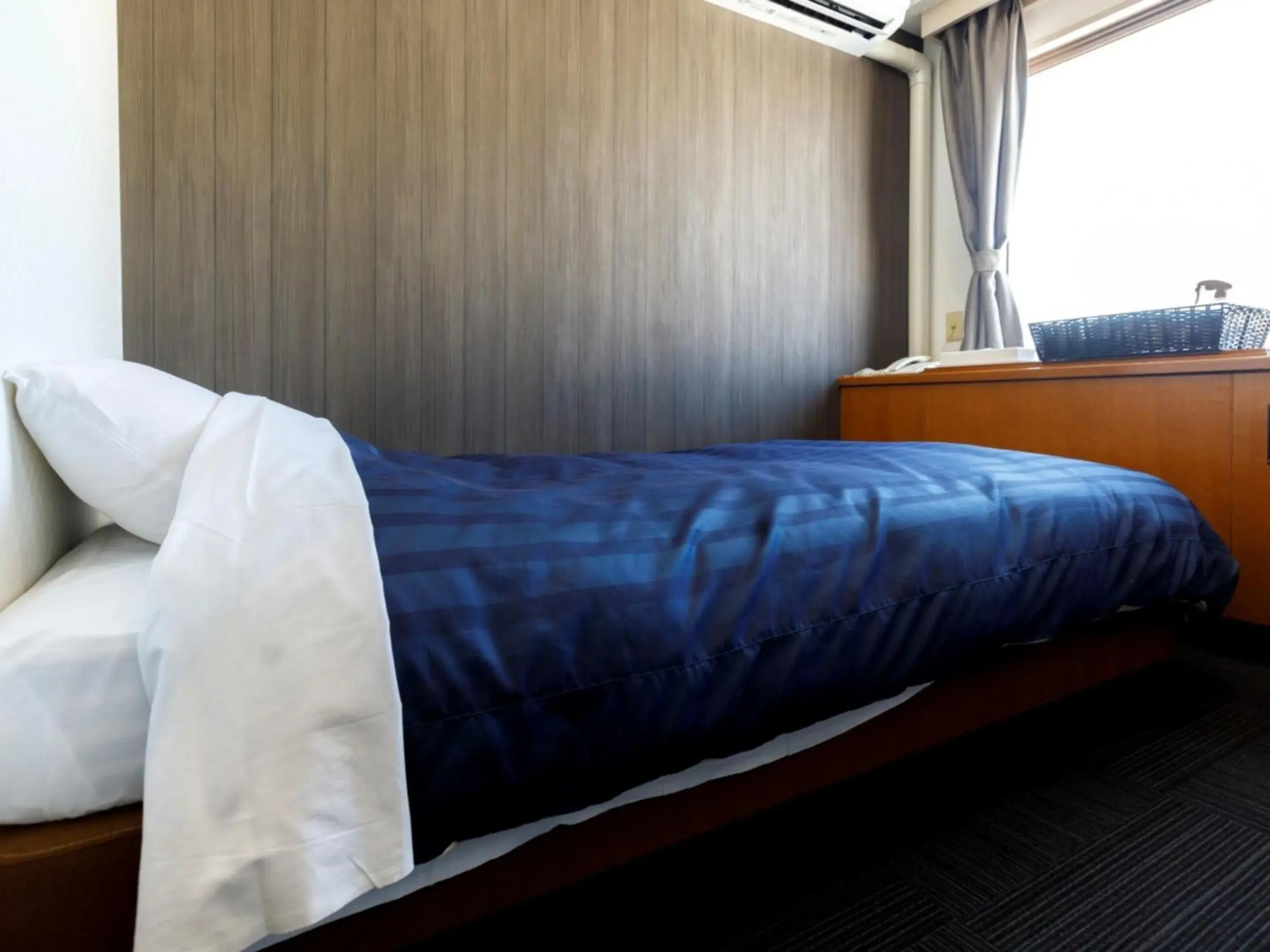 Bed in Miyazaki Lions Hotel Bed in Miyazaki Lions Hotel