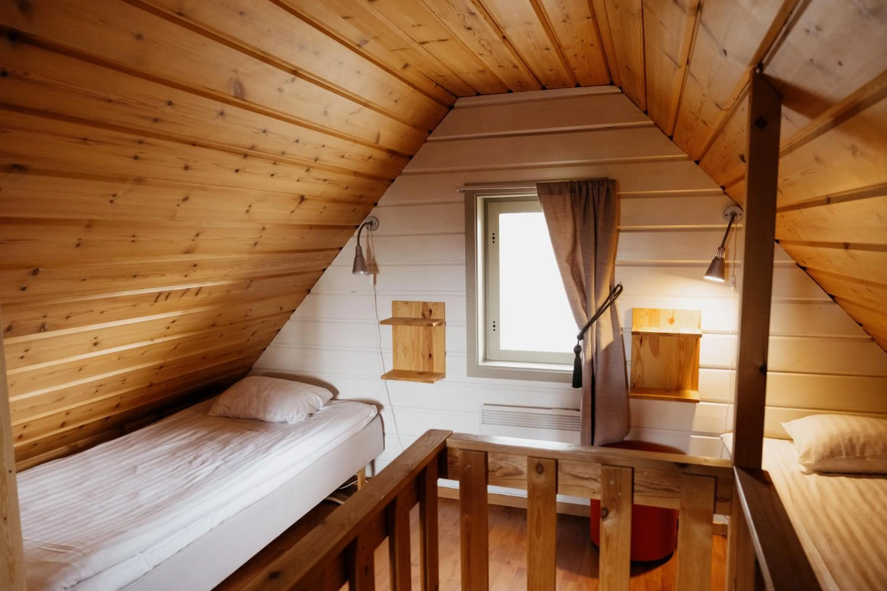 Photo of the whole room, Bed in Abisko Mountain Lodge