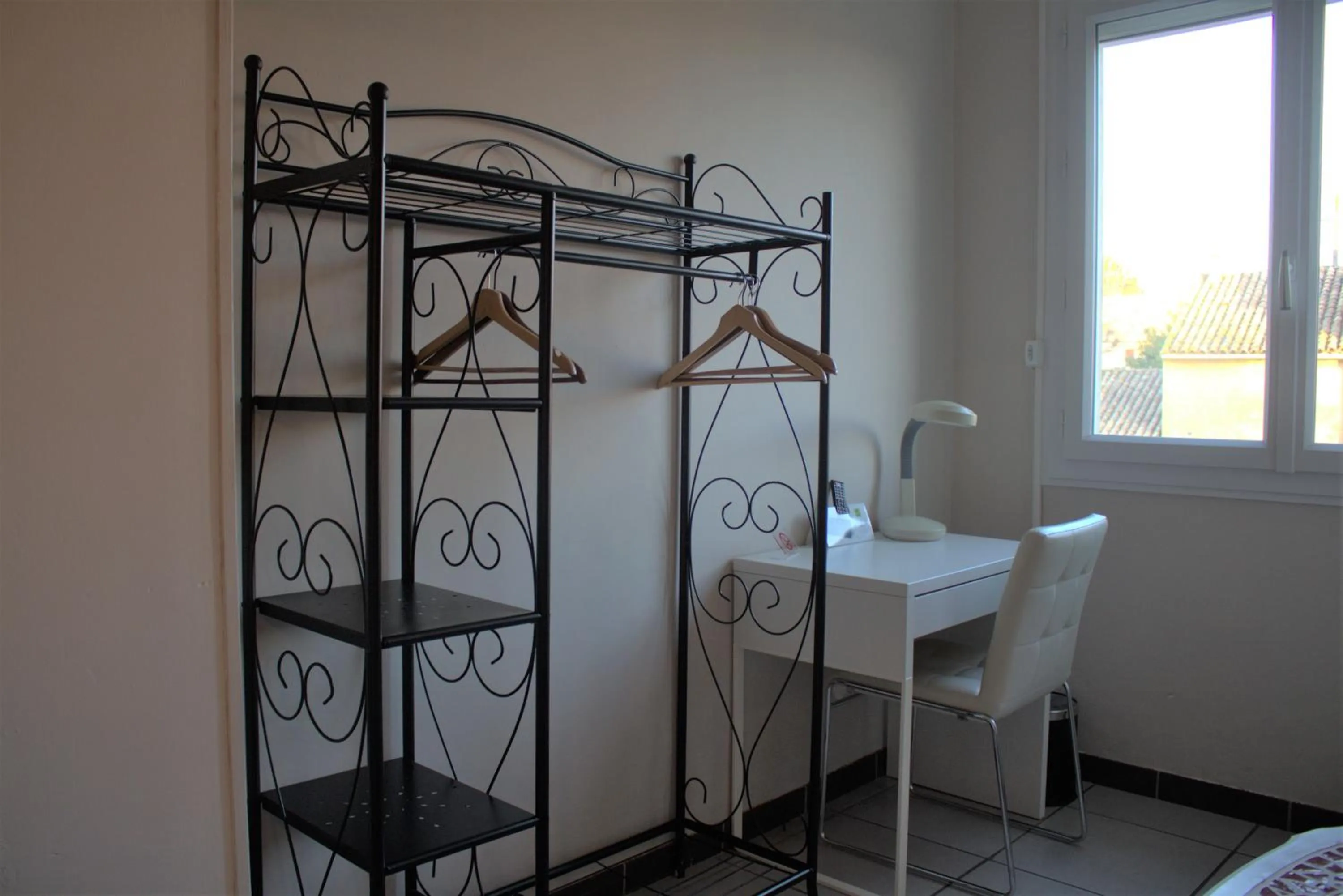 Seating area in Logis Hôtel Le Clement V