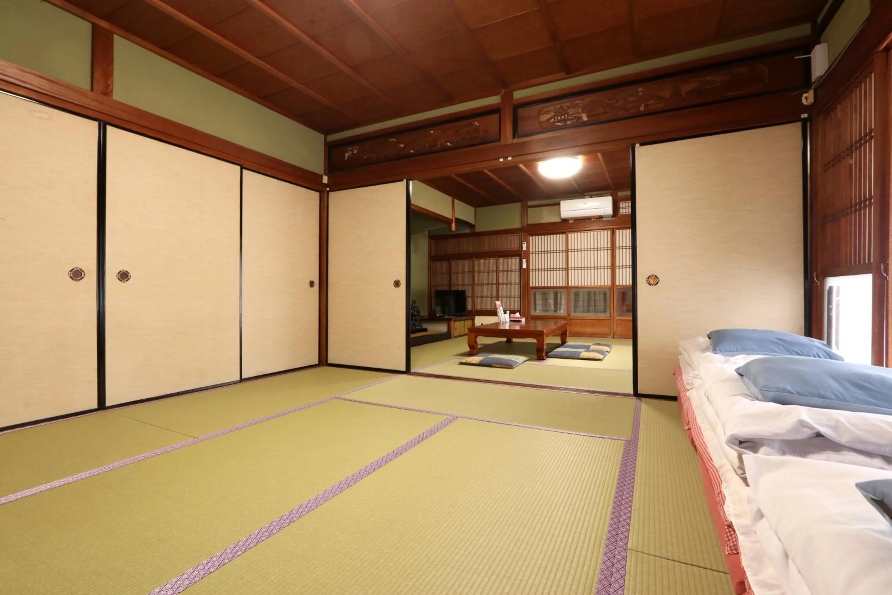 Bed in Marumo Ryokan