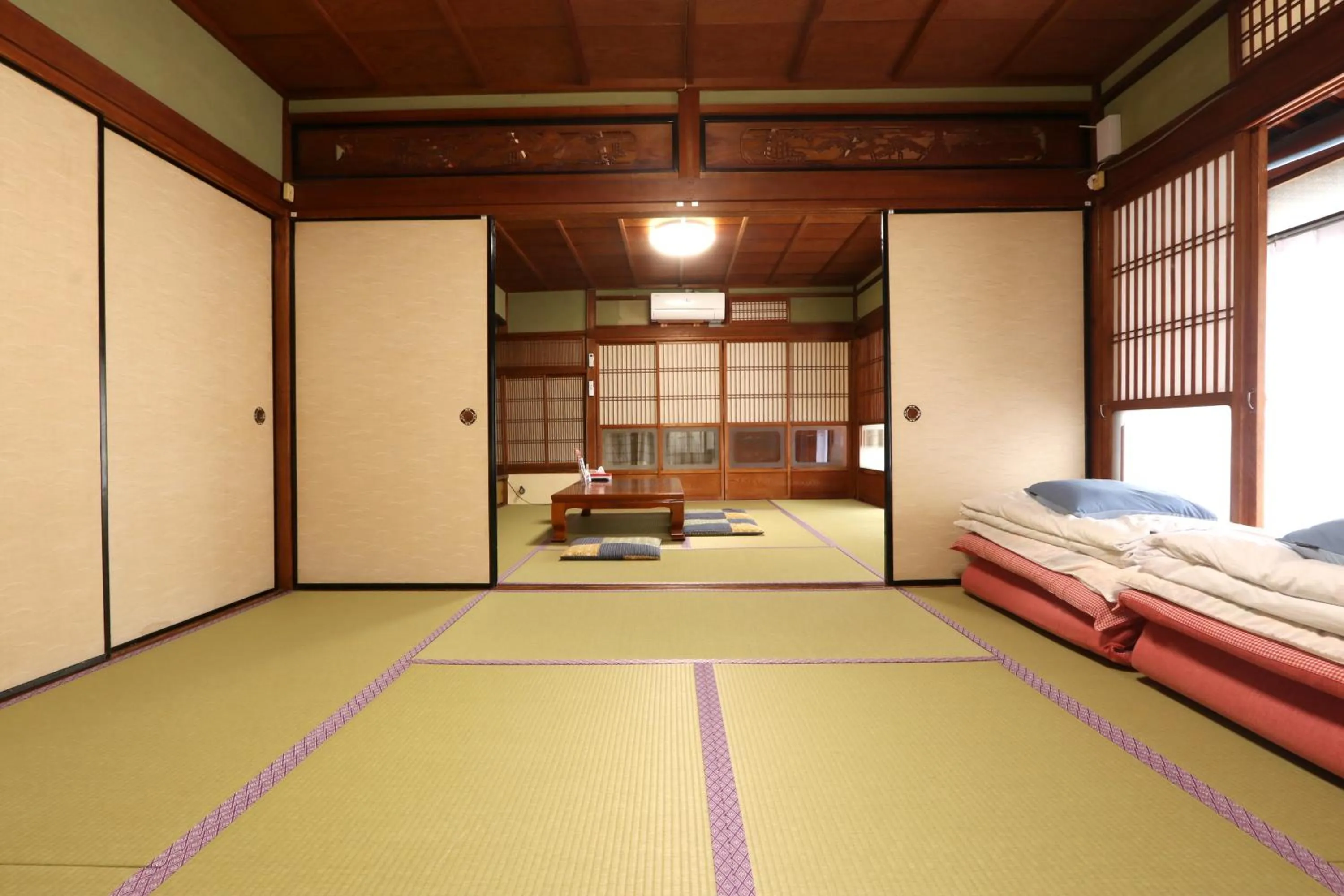 Bed in Marumo Ryokan