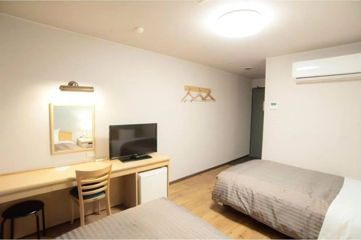 Bed in Fujieda Ogawa Hotel フジエダオガワホテル