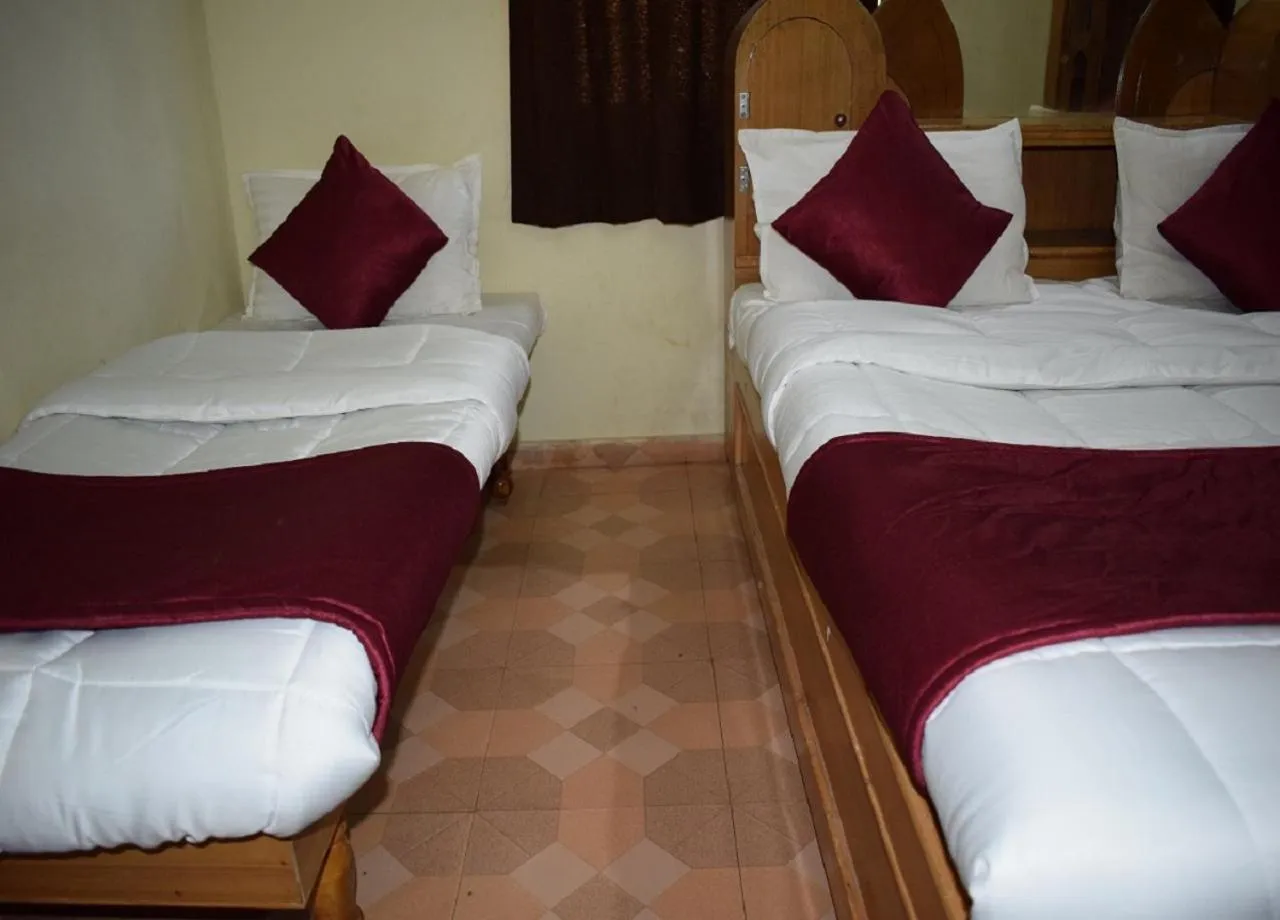 Bed in Manas Homestay by Sky Stays