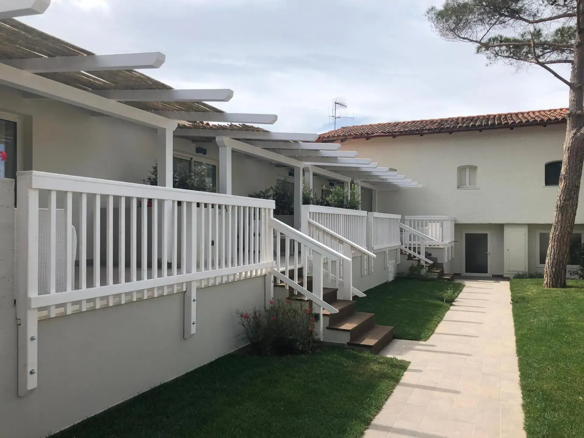 Property building in Club Esse Cala Bitta Property building in Club Esse Cala Bitta