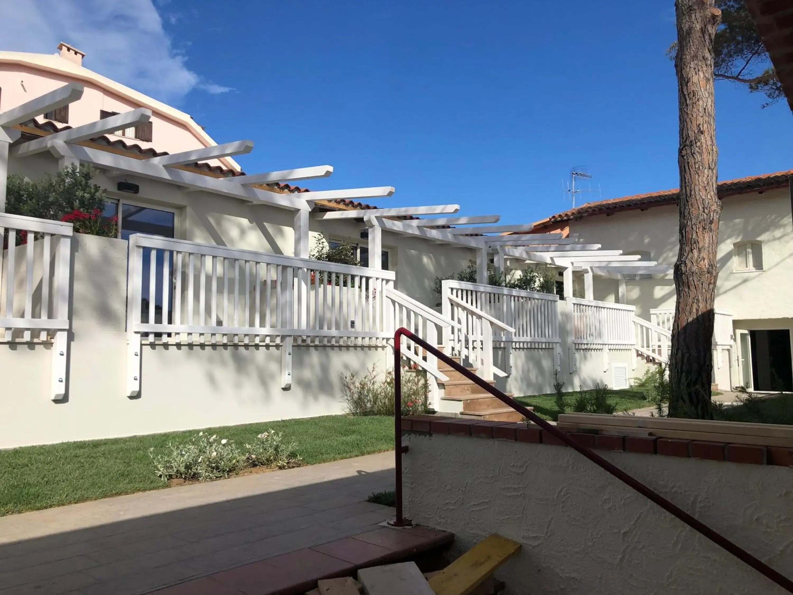 Property building in Club Esse Cala Bitta Property building in Club Esse Cala Bitta