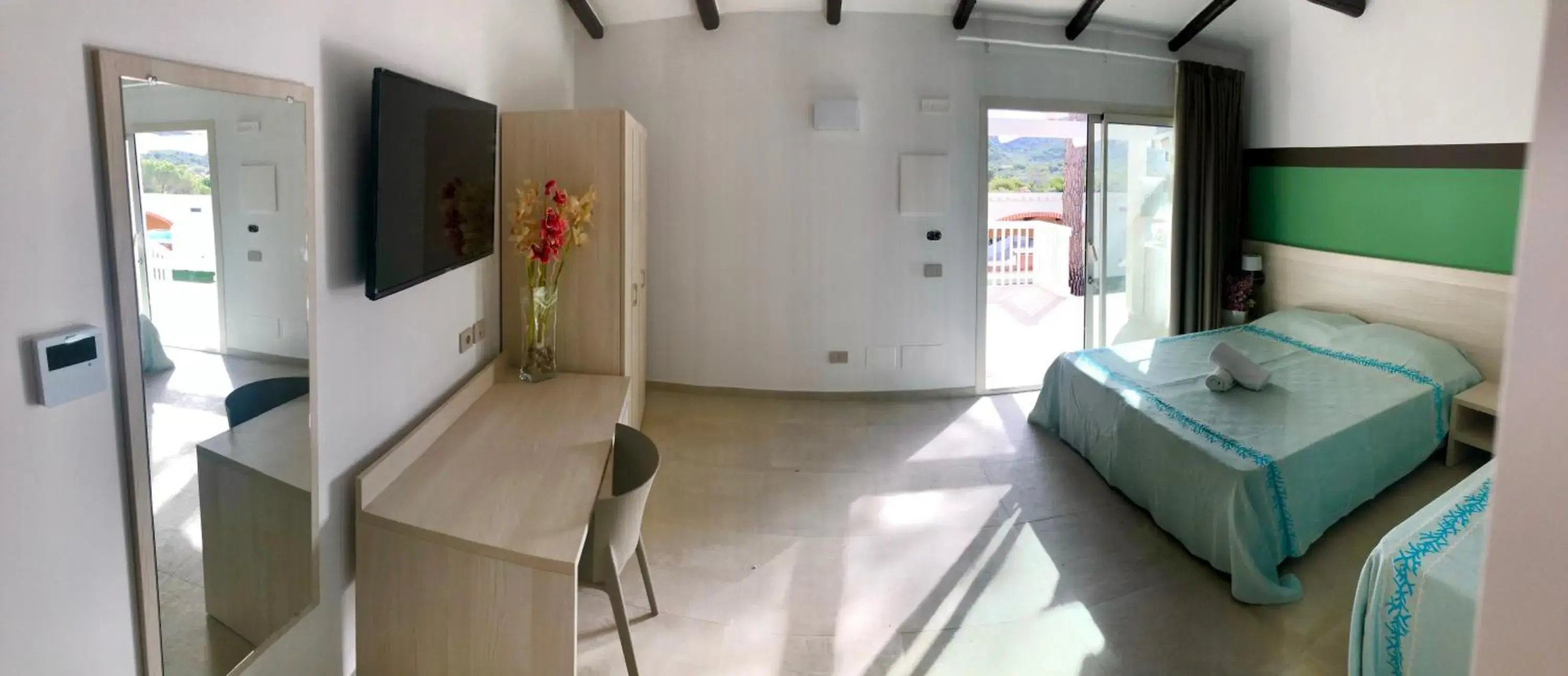 Photo of the whole room, Bed in Club Esse Cala Bitta Photo of the whole room, Bed in Club Esse Cala Bitta