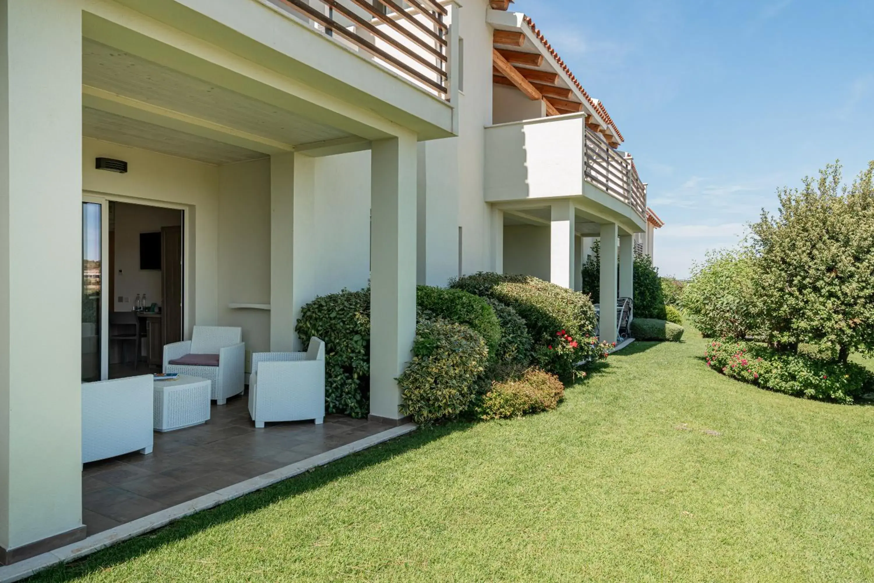 Property building in Club Esse Cala Bitta Property building in Club Esse Cala Bitta