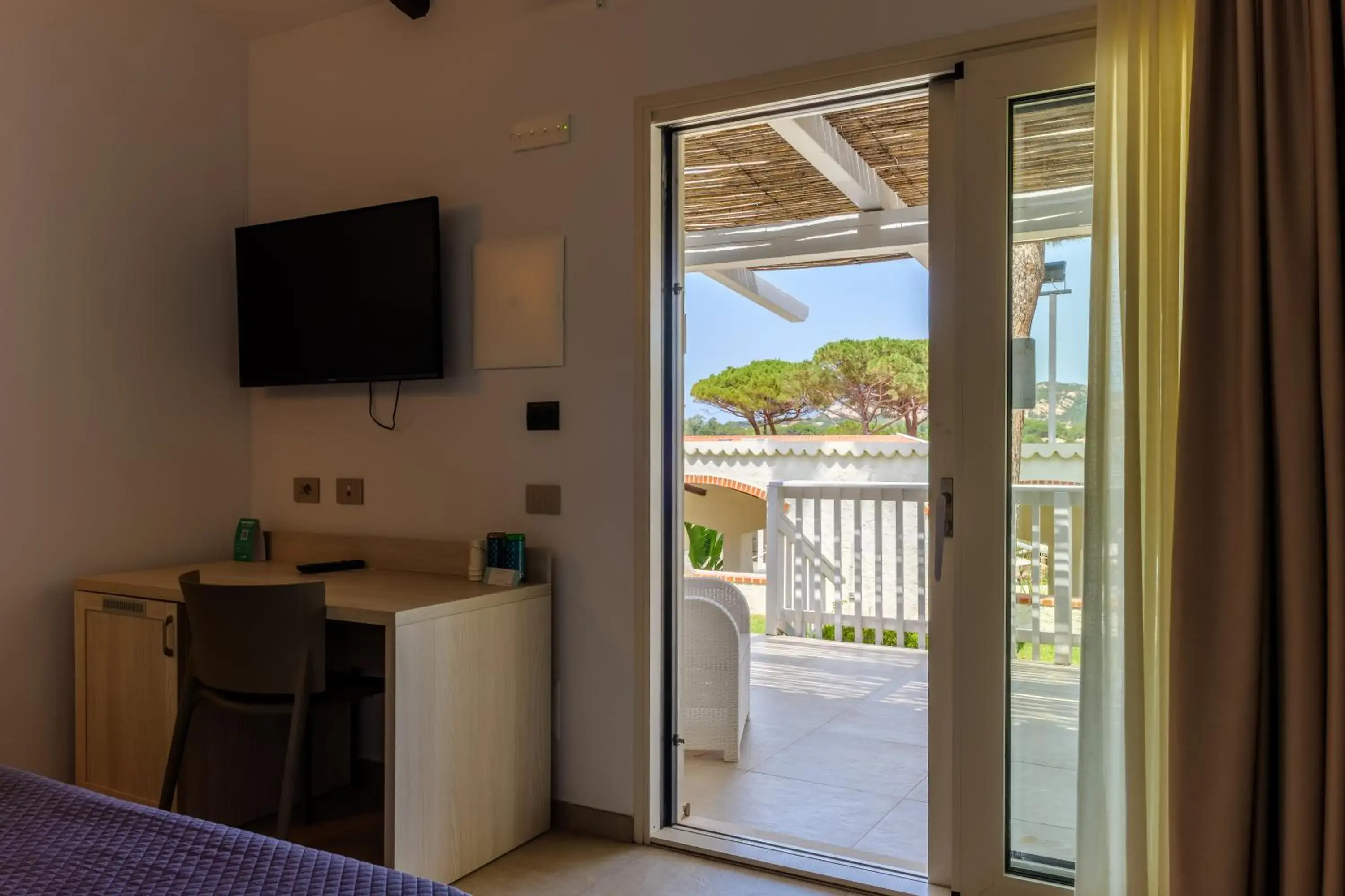 Bedroom in Club Esse Cala Bitta Bedroom in Club Esse Cala Bitta