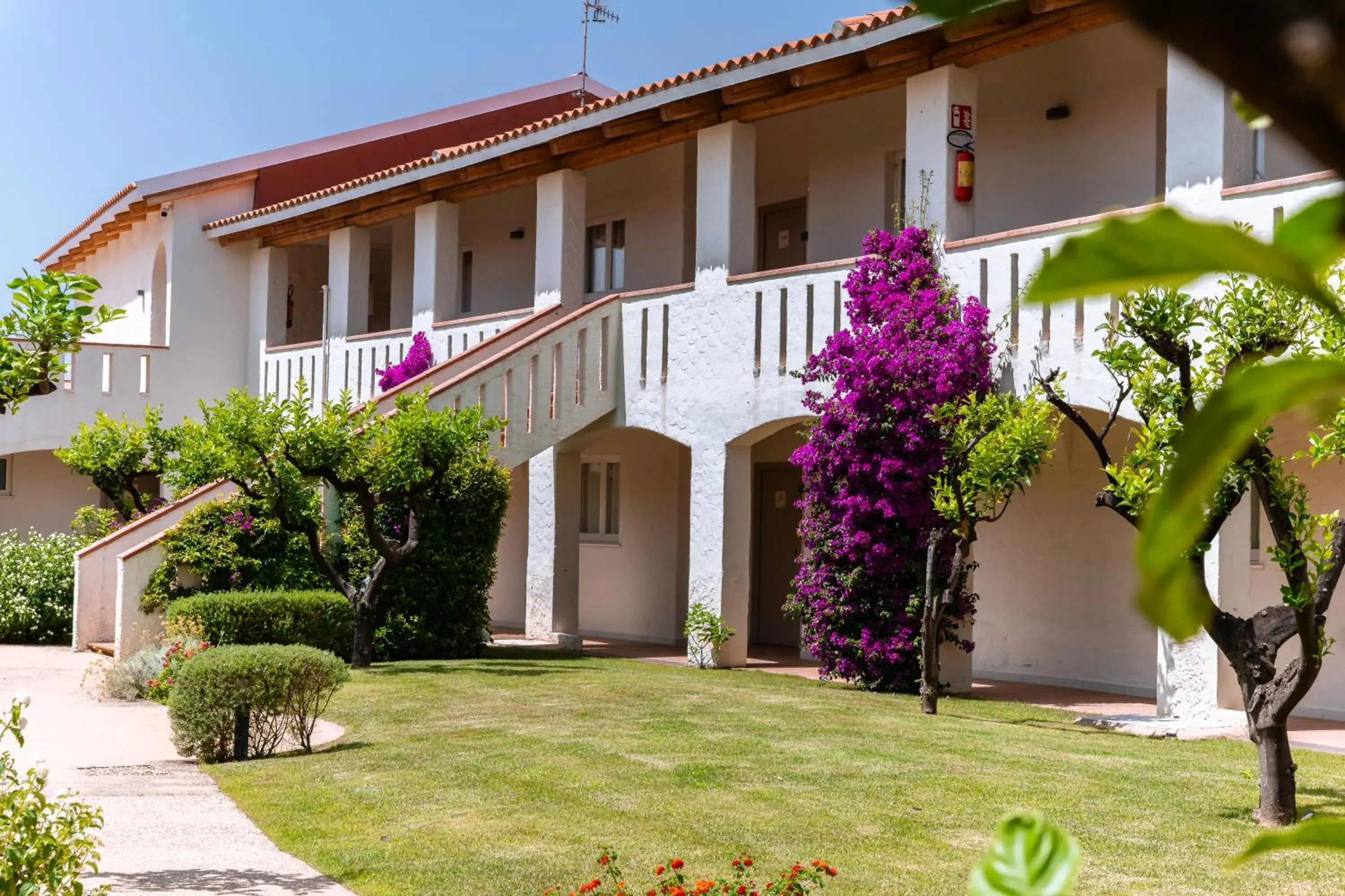 Property building in Club Esse Cala Bitta Property building in Club Esse Cala Bitta