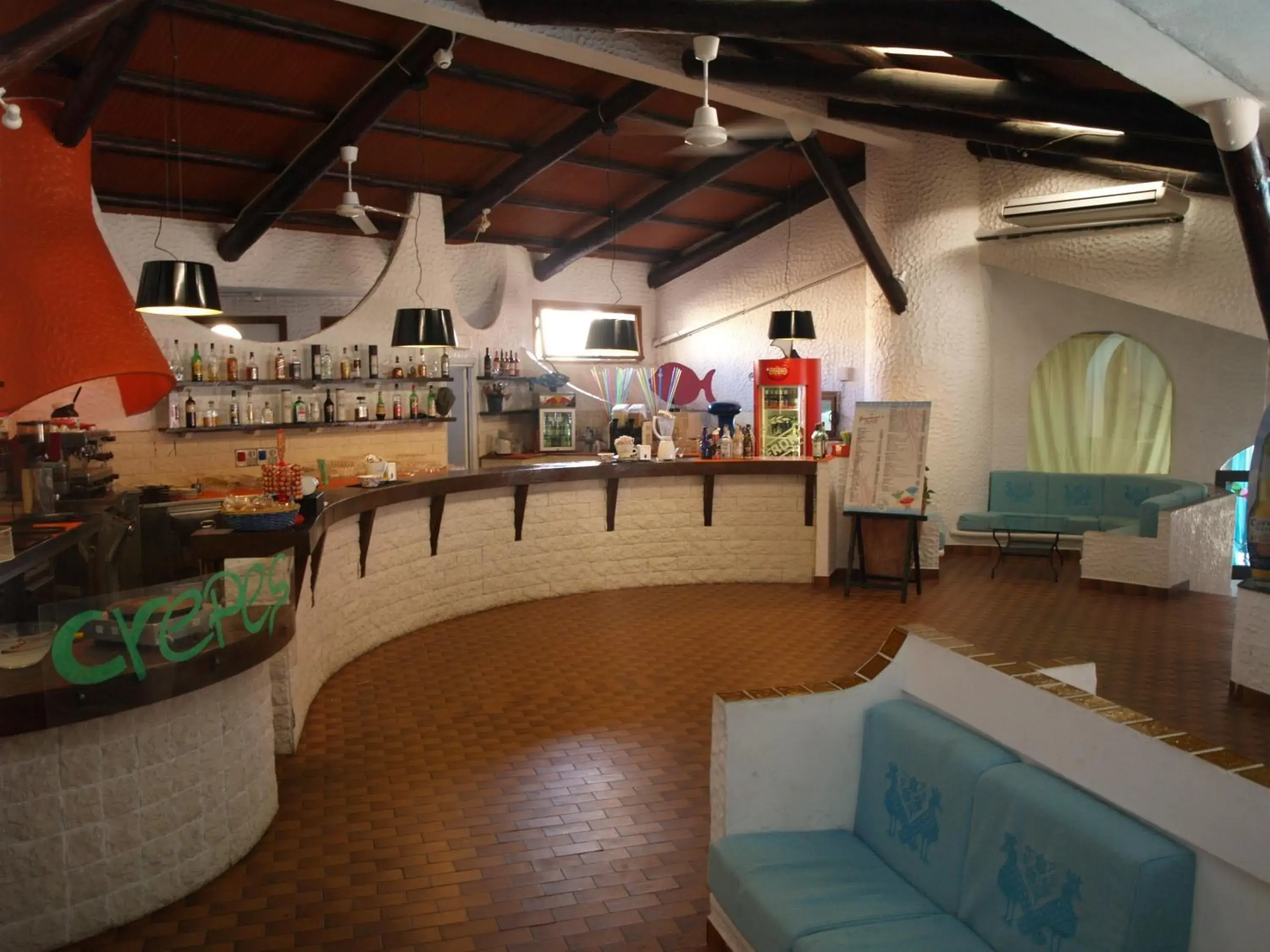 Lounge or bar in Club Esse Cala Bitta Lounge or bar in Club Esse Cala Bitta