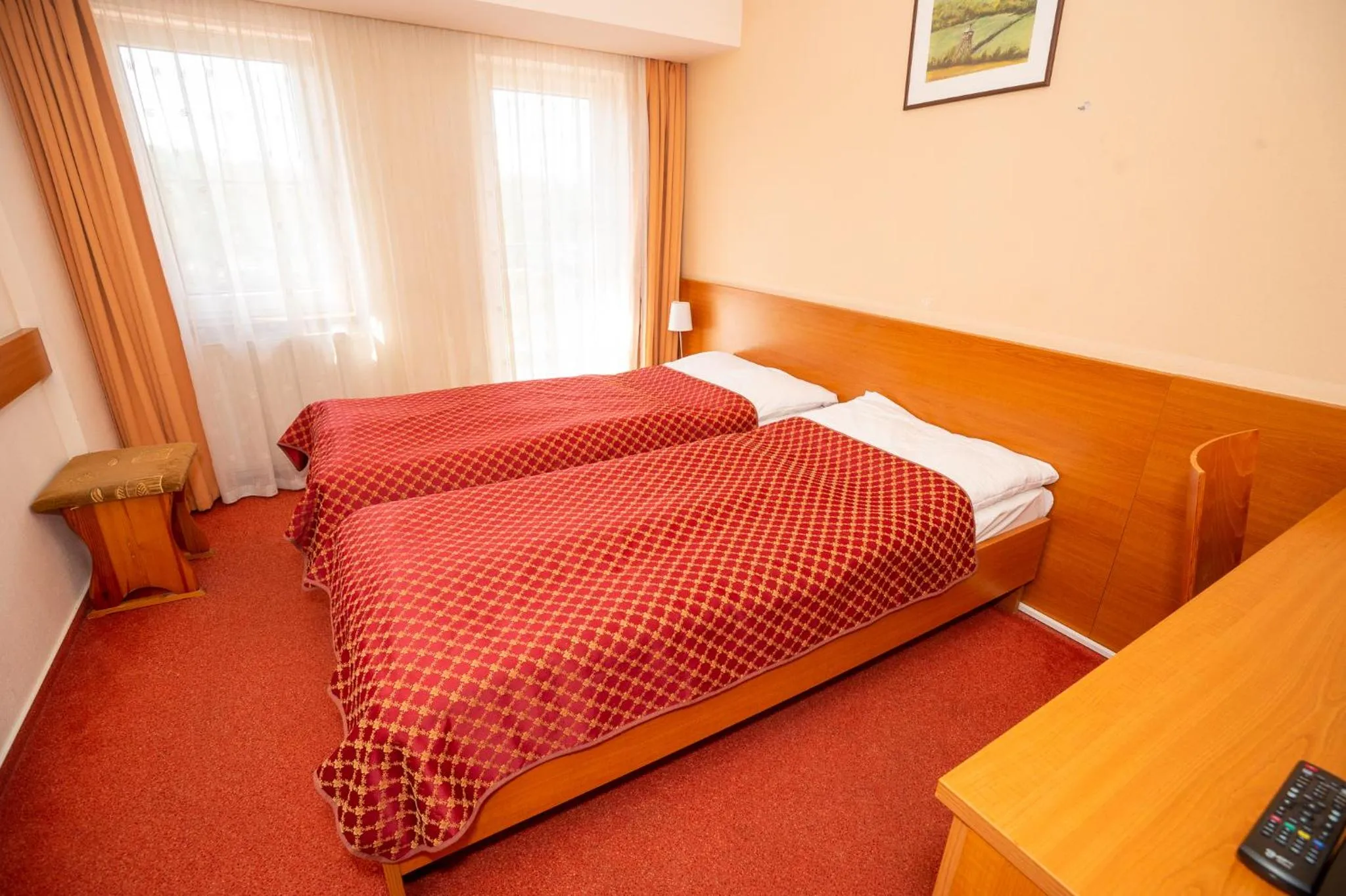 Bed in Hotel Dominika