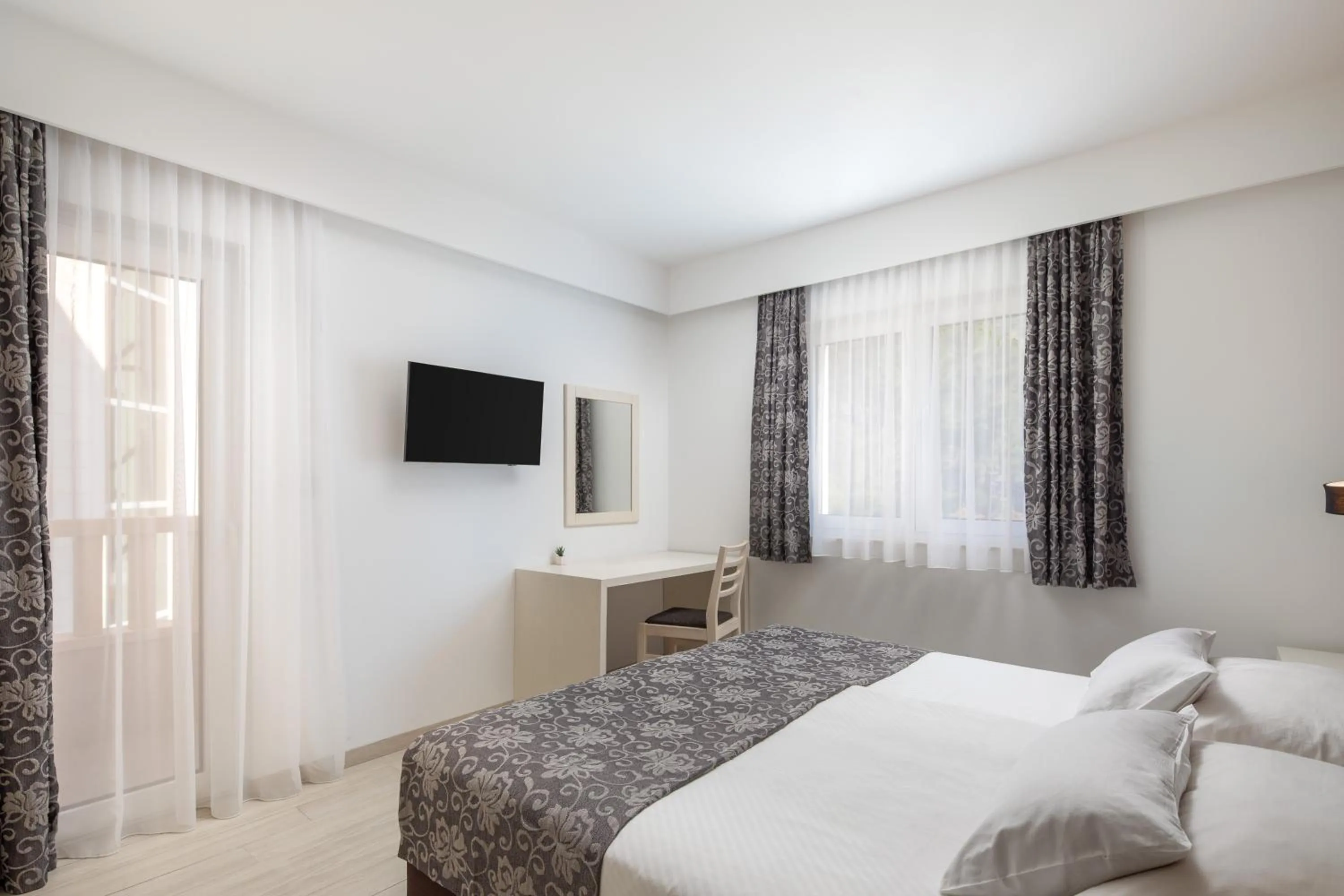 Bed in Hotel Tamaris