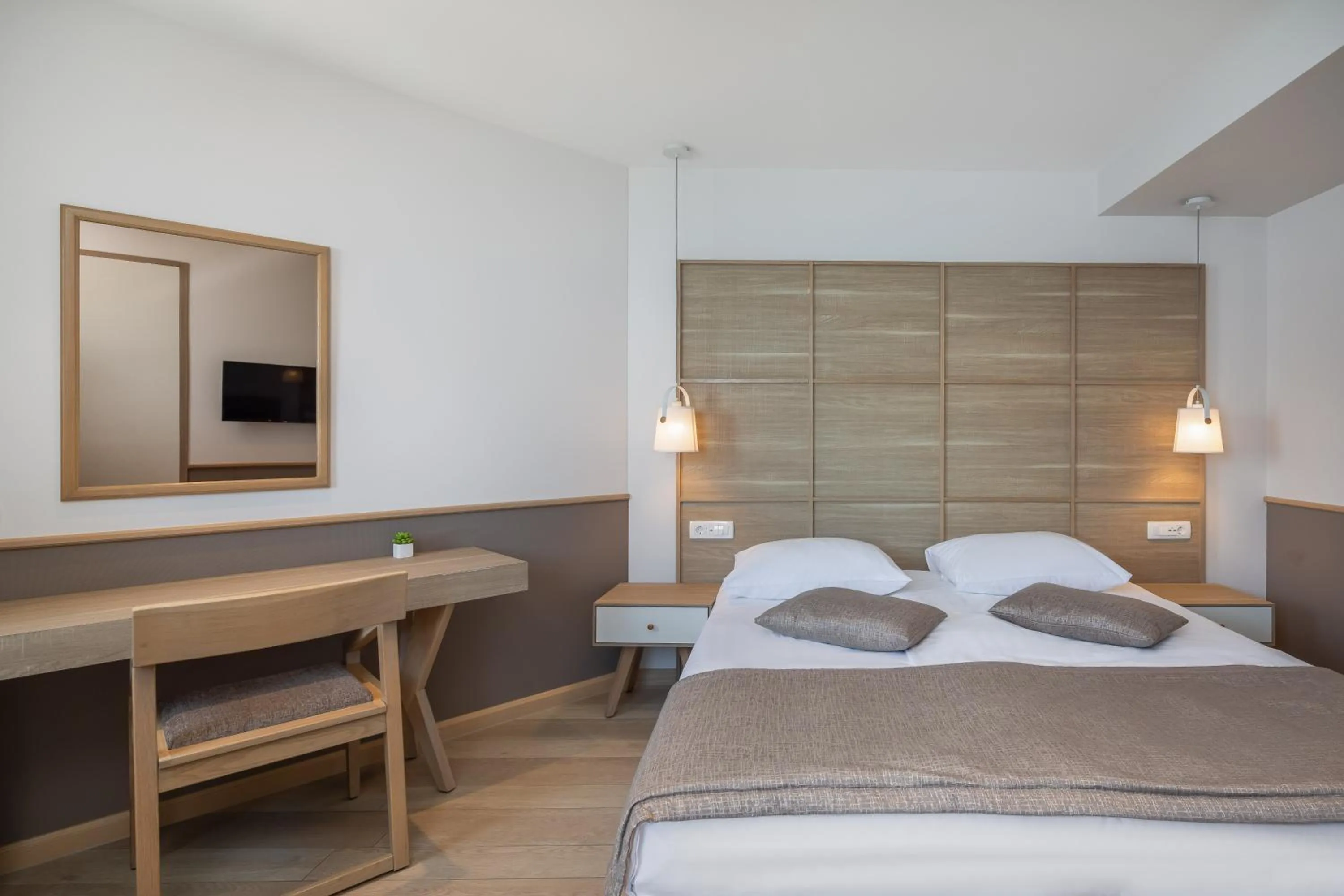 Bed in Hotel Tamaris