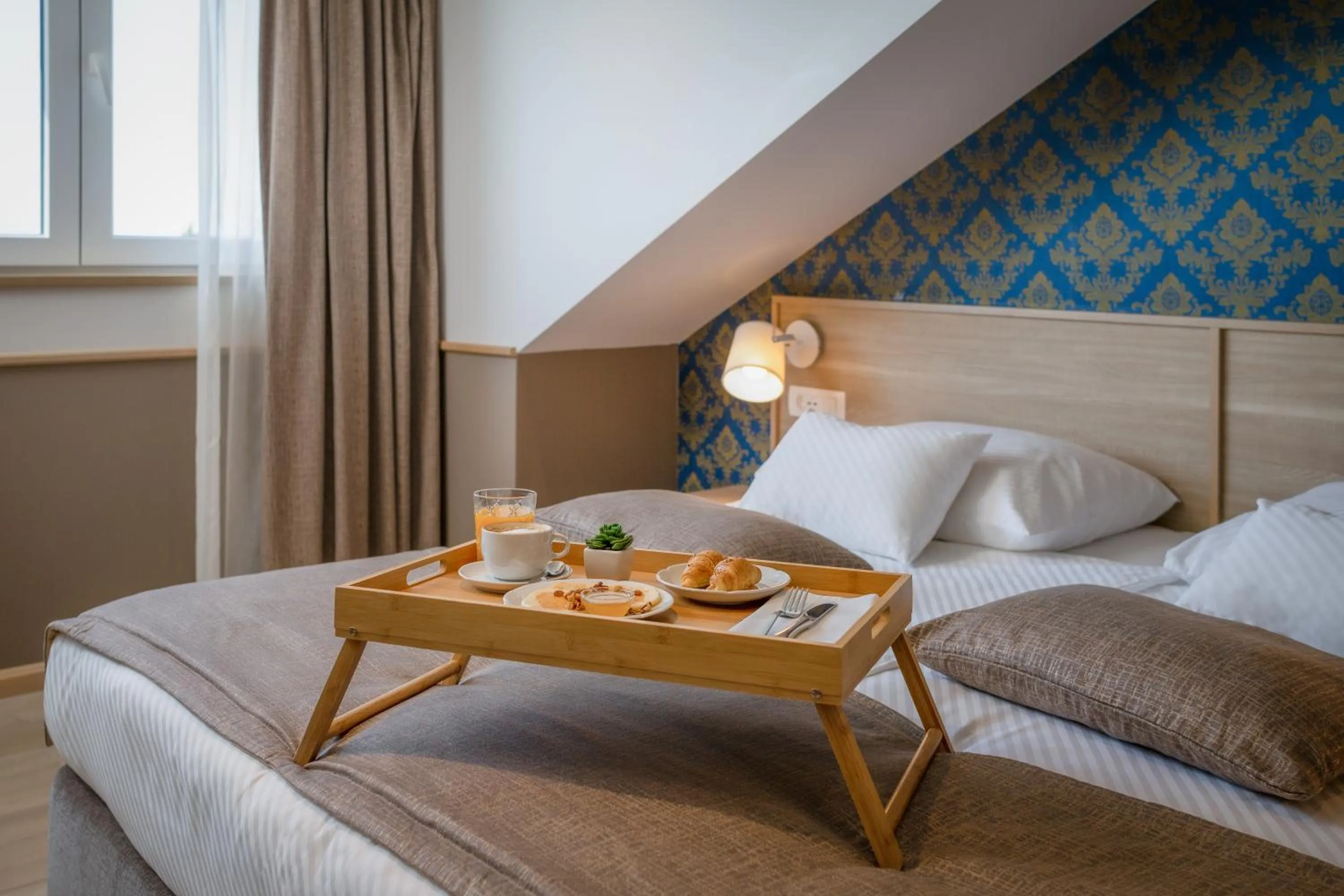 Bed in Hotel Tamaris