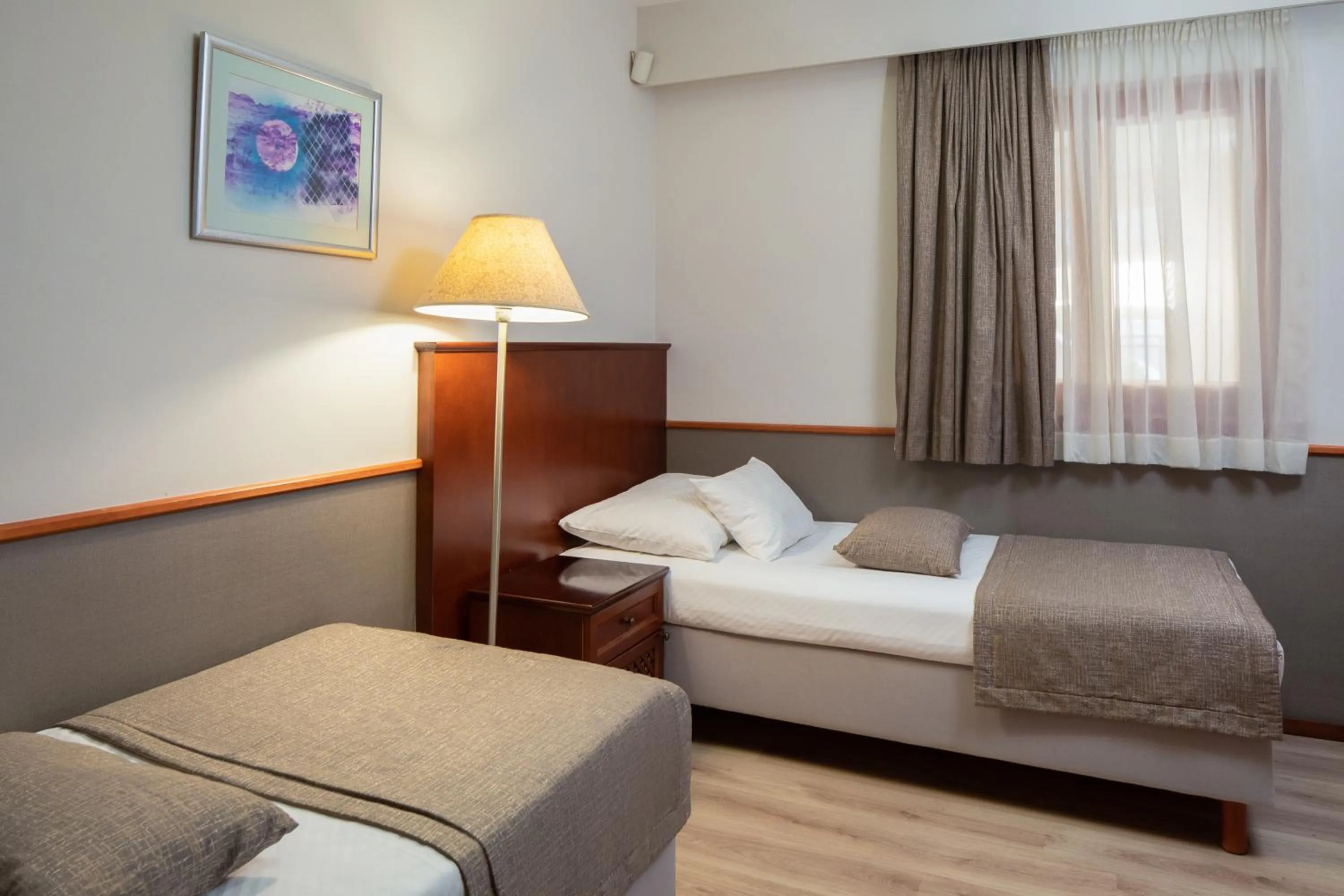 Bed in Hotel Tamaris