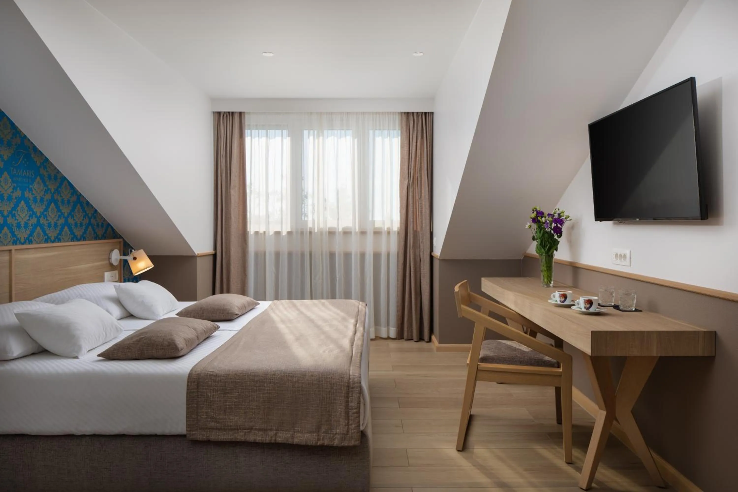 Bed in Hotel Tamaris