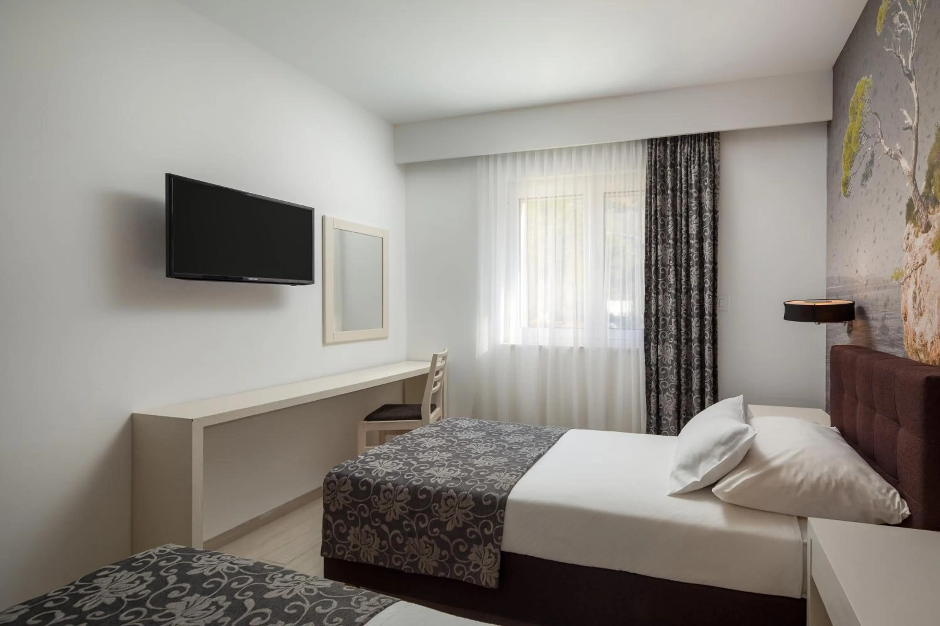 Bed in Hotel Tamaris