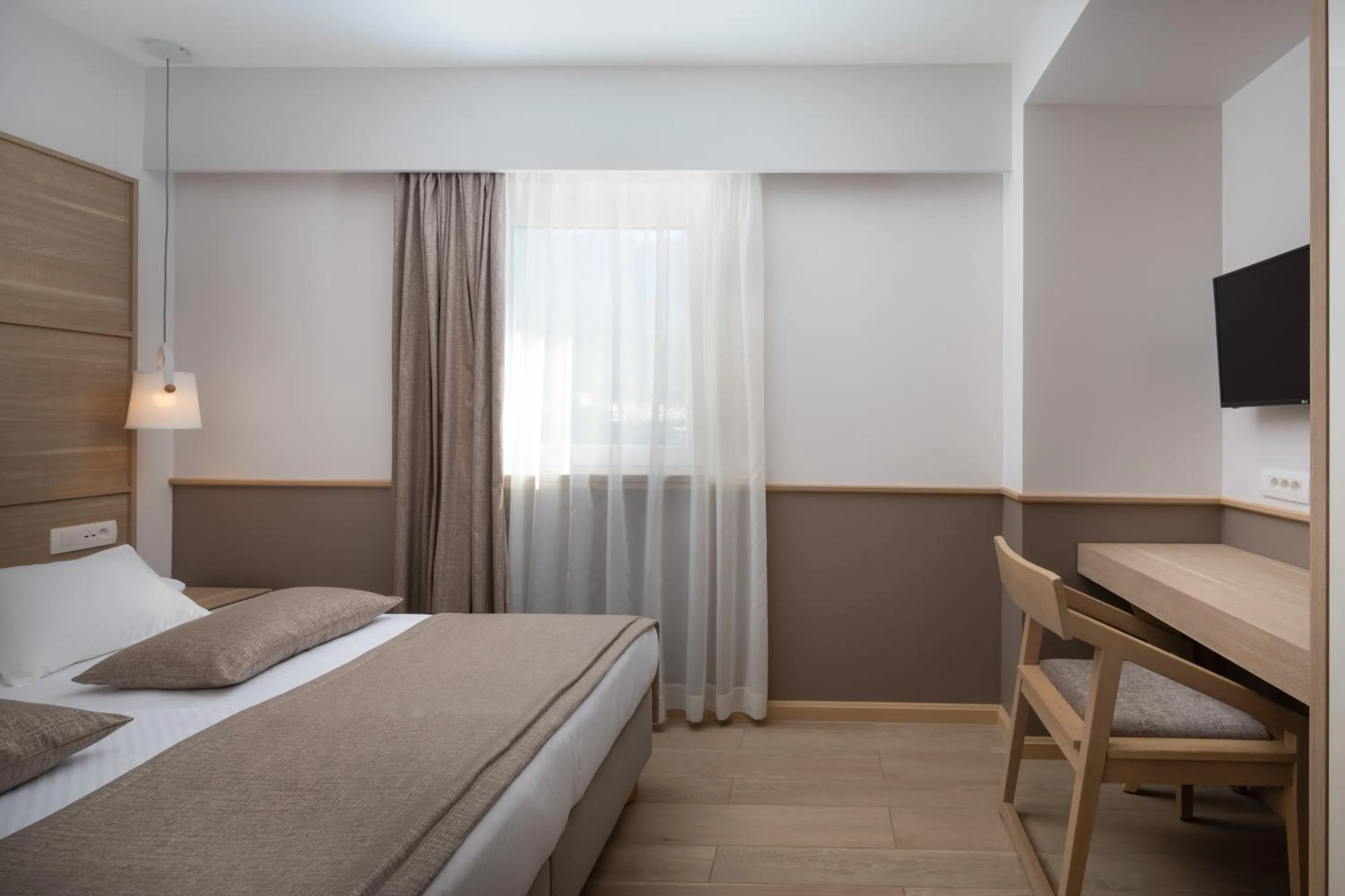 Bed in Hotel Tamaris