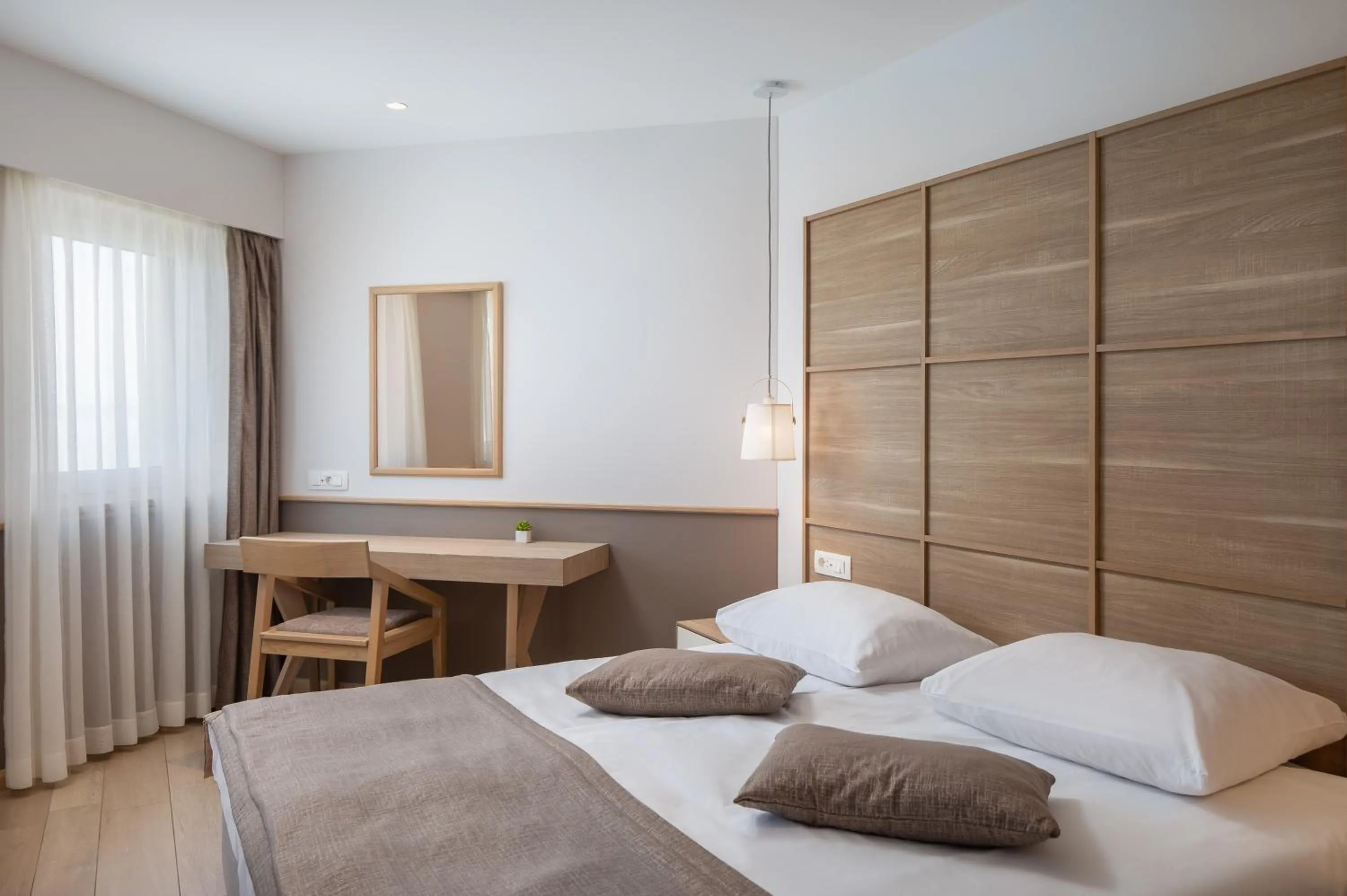 Bed in Hotel Tamaris