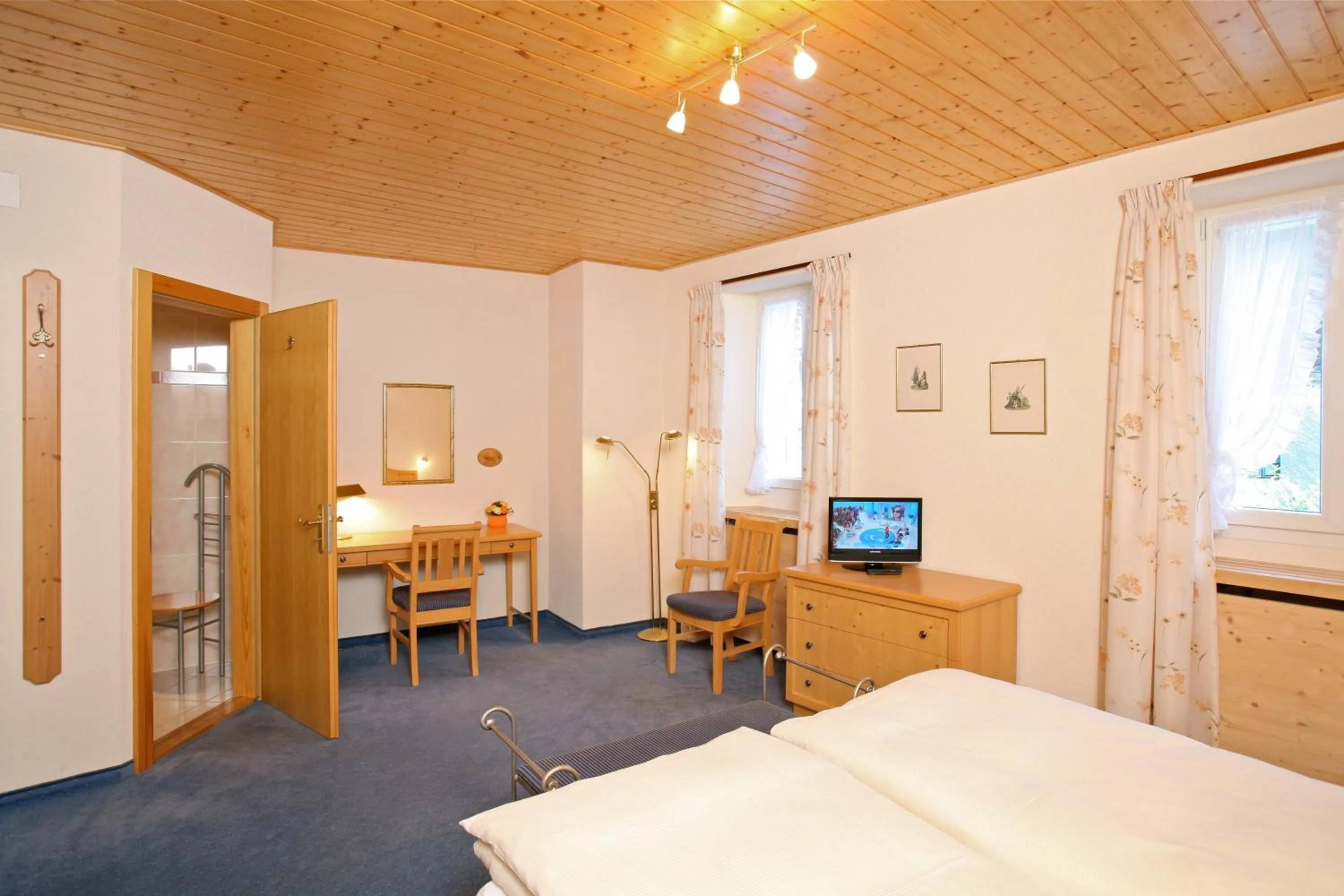 Bed in Hôtel du Cerf