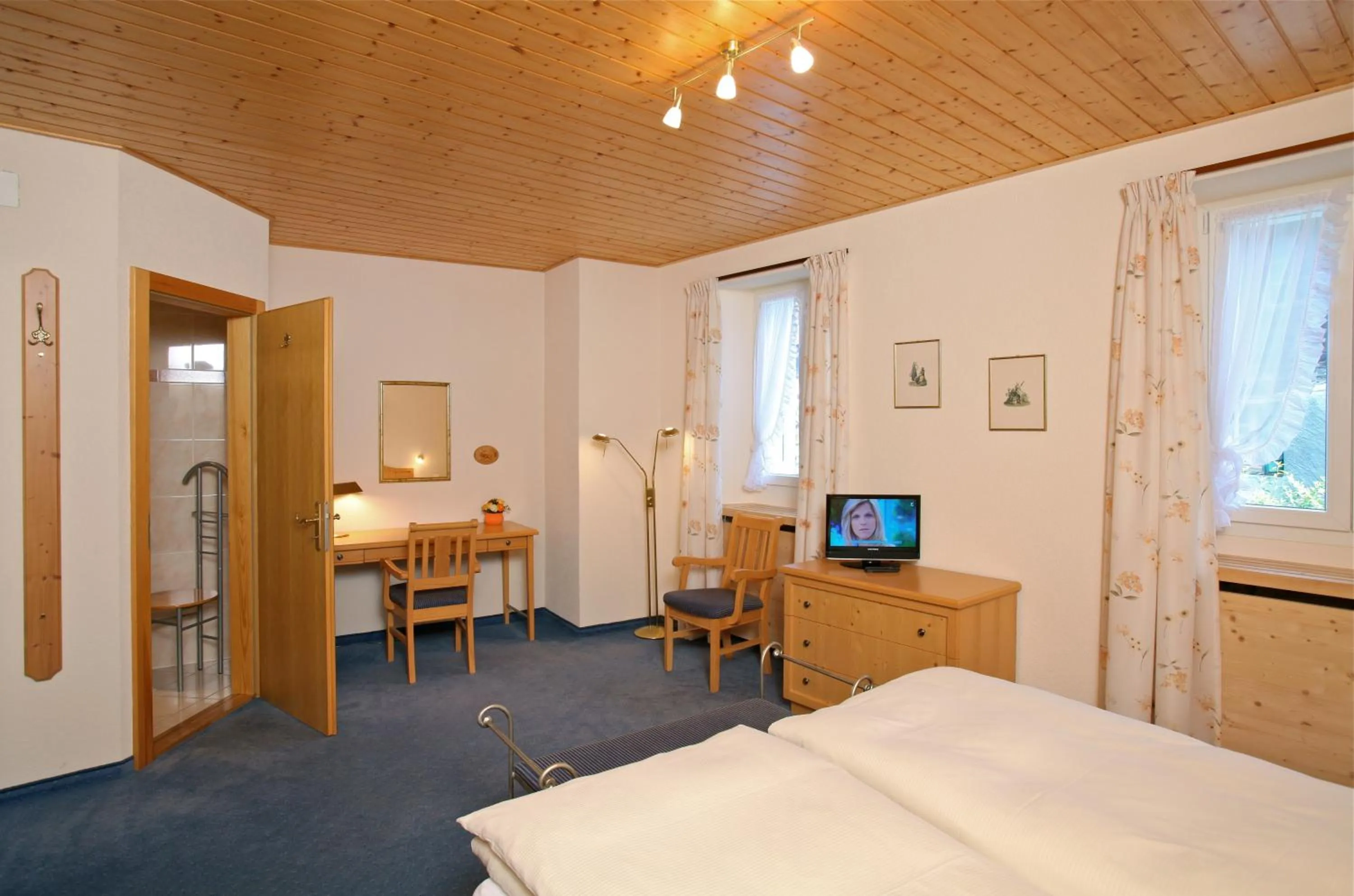 Bed in Hôtel du Cerf