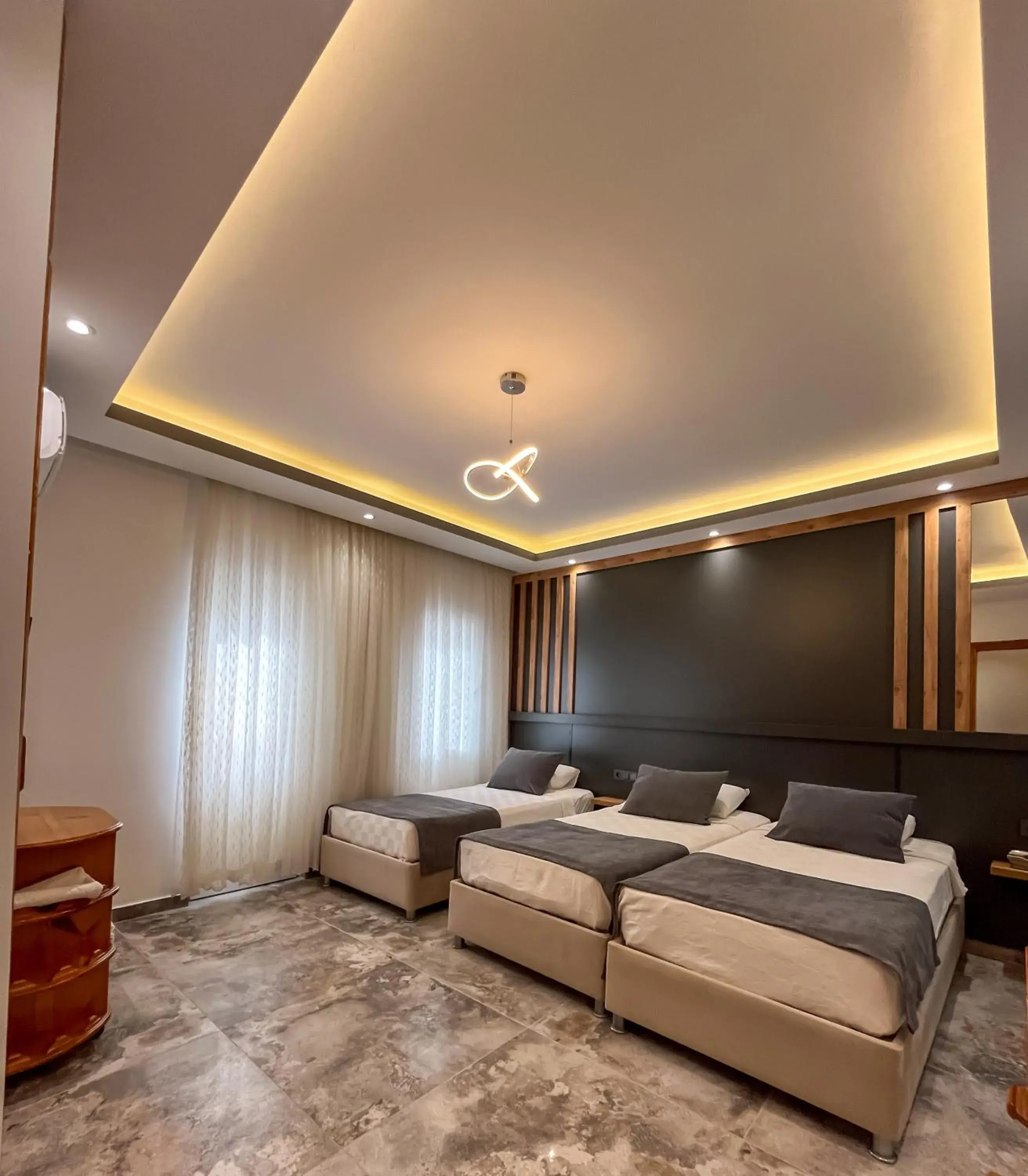 Triple Room in Rain Hotel Triple Room in Rain Hotel