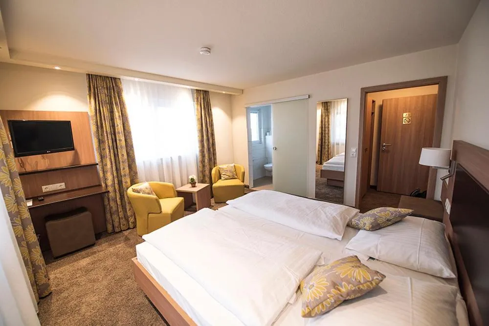 Photo of the whole room, Bed in Gasthof Pfauen