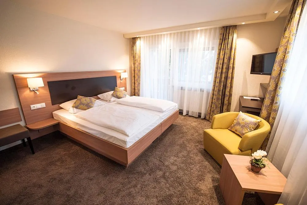 Photo of the whole room, Bed in Gasthof Pfauen