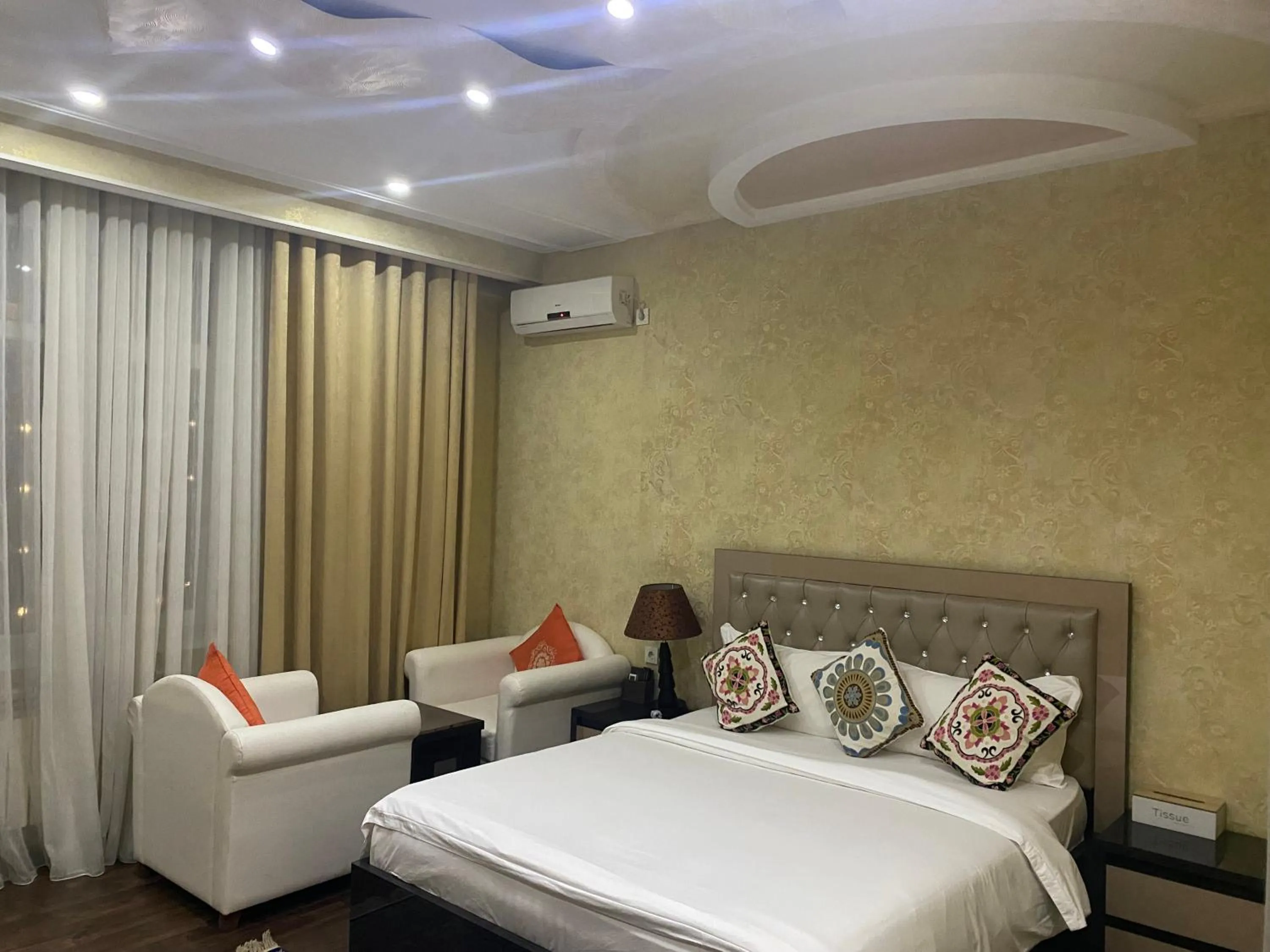 Bed in Sunrise Apartments