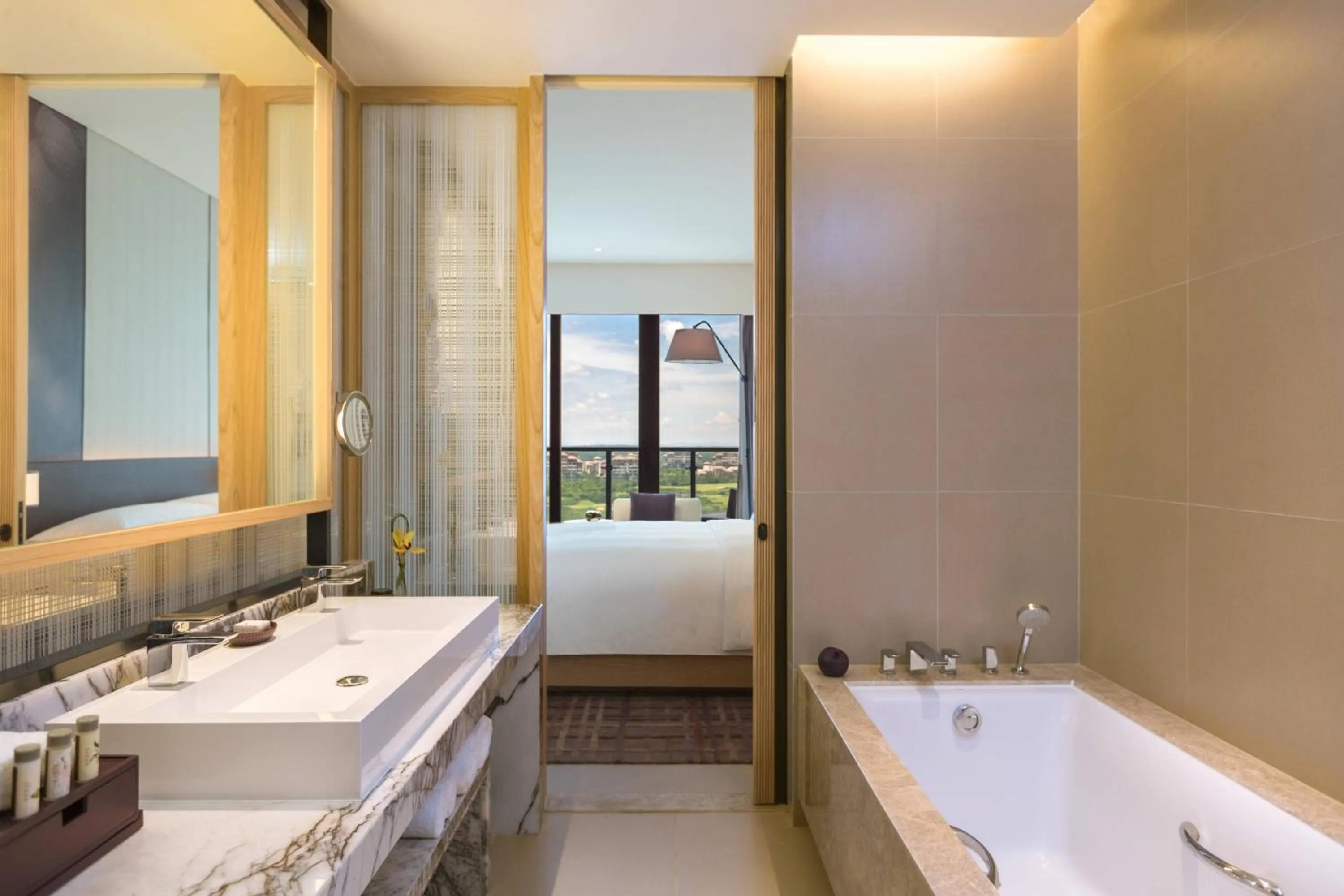 Bathroom, Bed in Renaissance Haikou Hotel