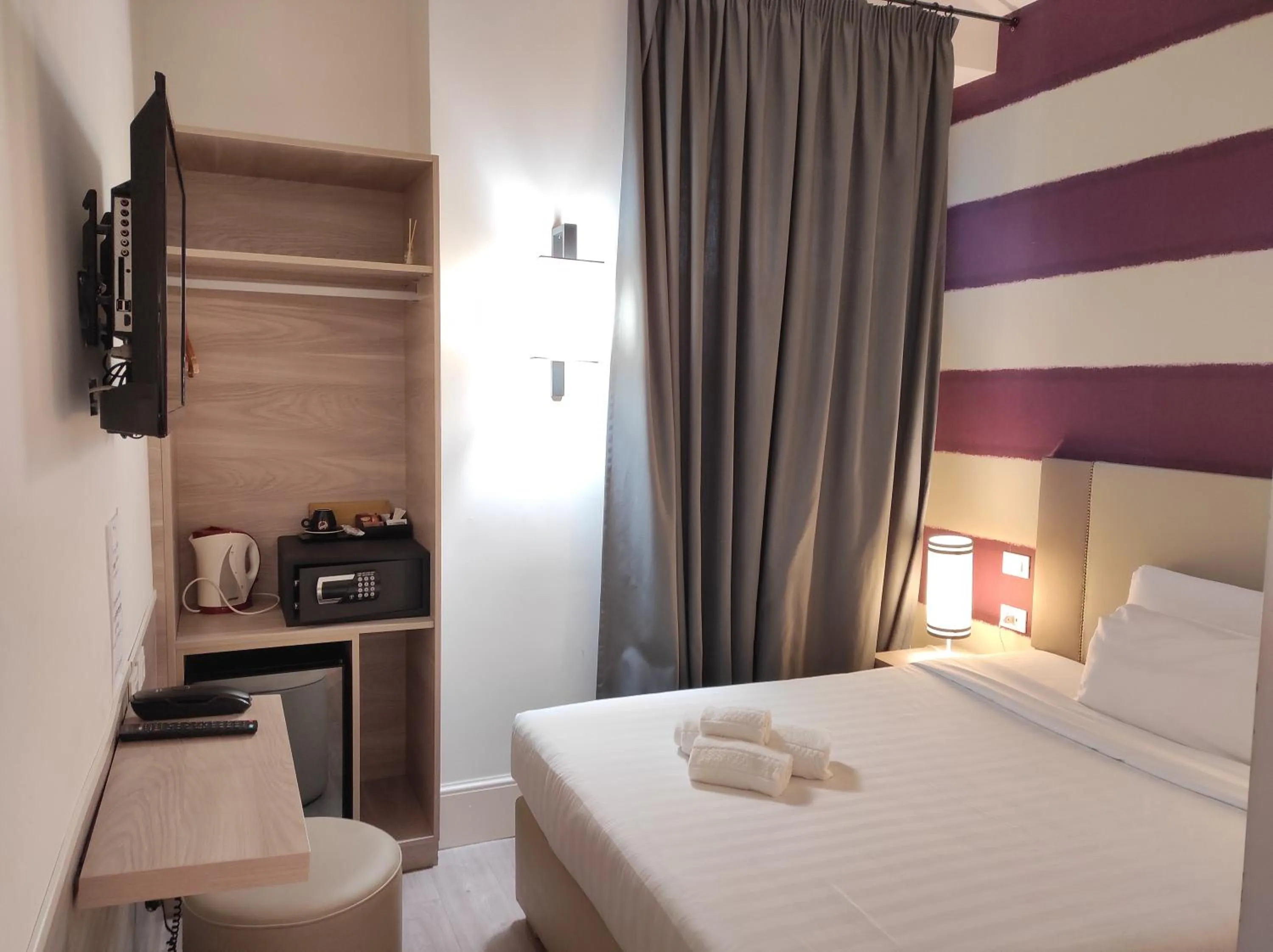 Bed in Relais Santa Maria Maggiore