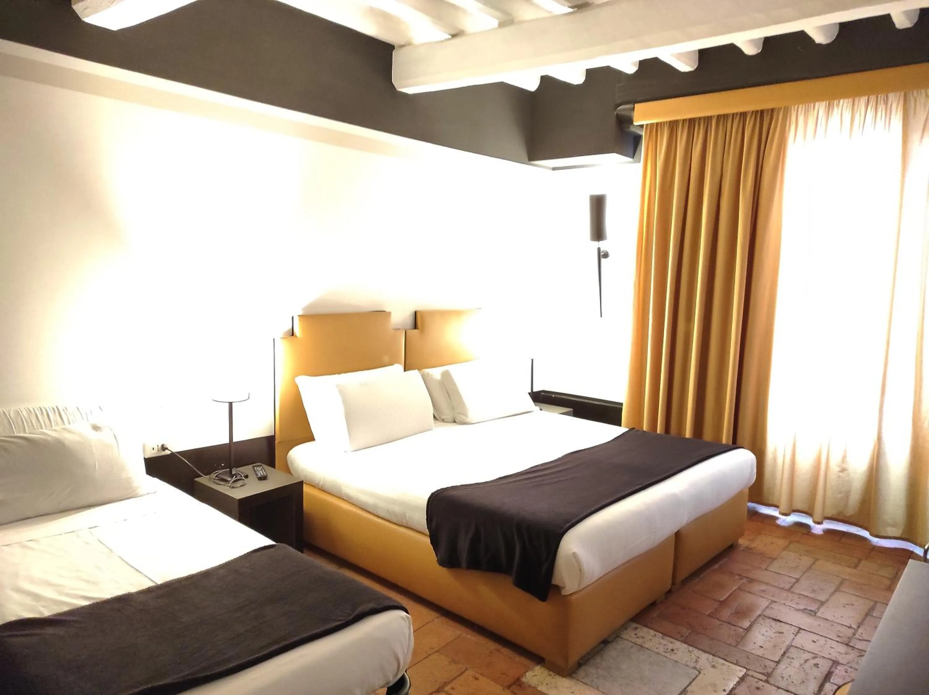 Bed in Relais Santa Maria Maggiore