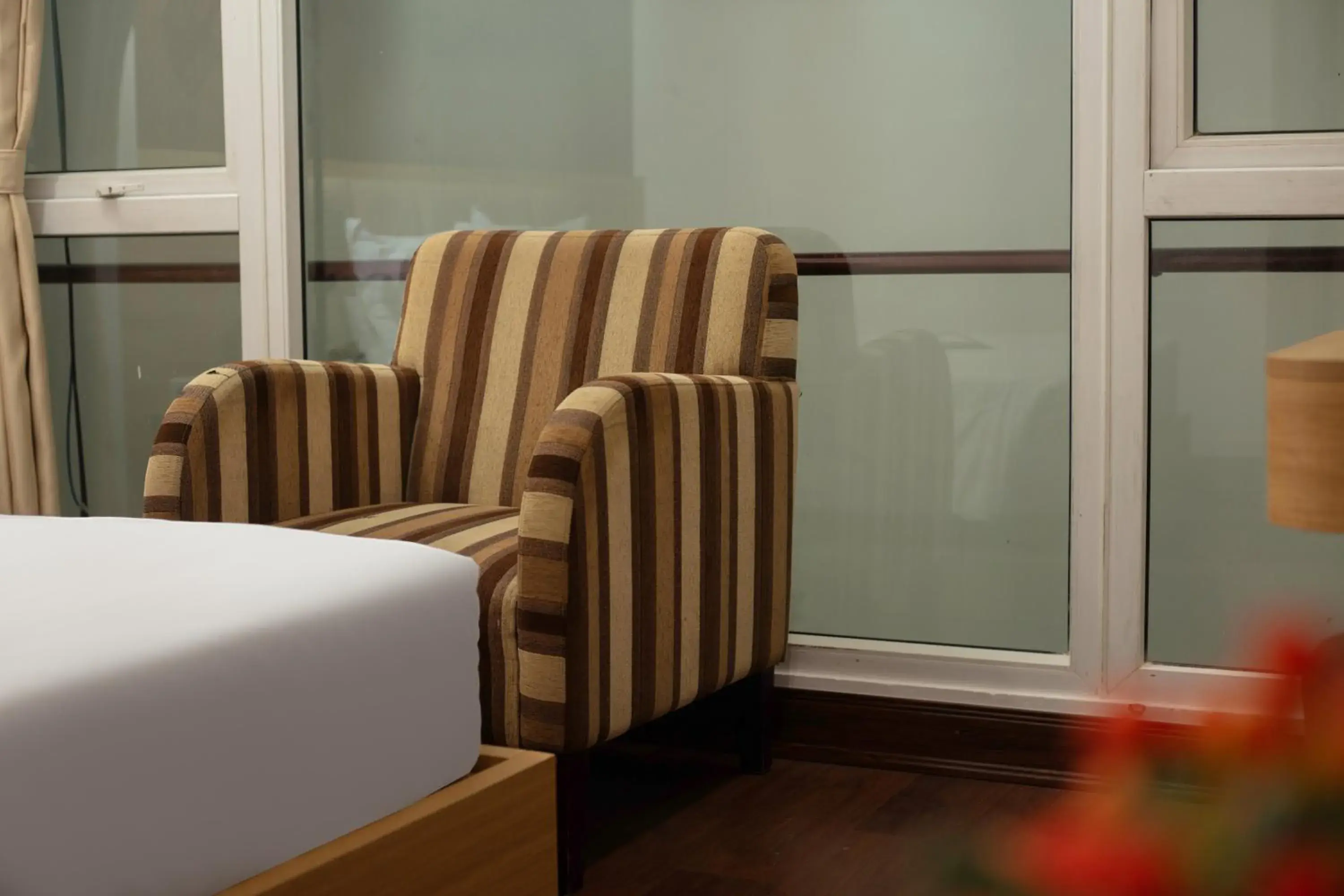 Seating area, Bed in Millennium Hanoi Hotel Seating area, Bed in Millennium Hanoi Hotel