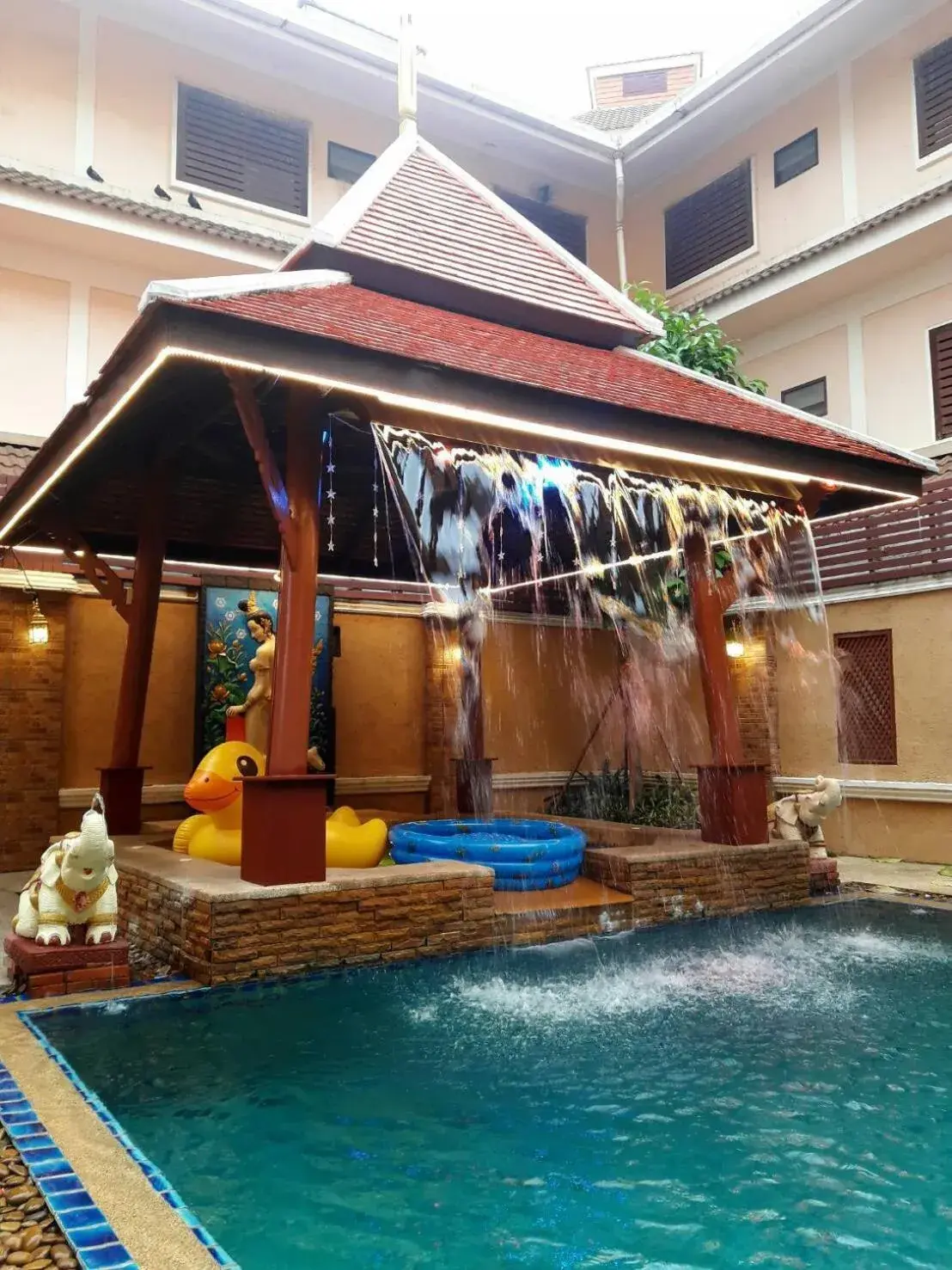 Swimming pool in Aiyaree Place Hotel SHA PLUS Swimming pool in Aiyaree Place Hotel SHA PLUS