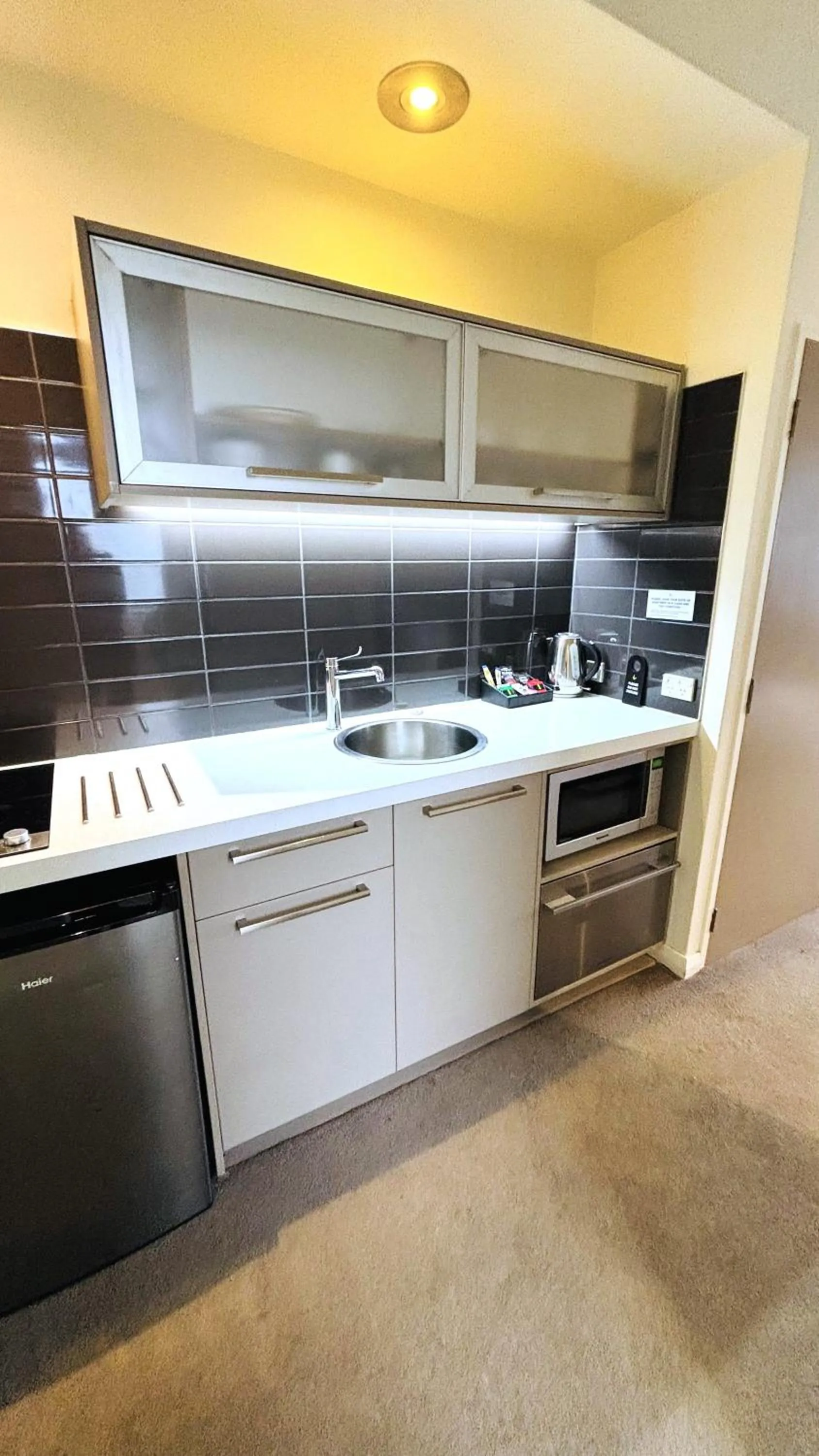 Kitchen or kitchenette in Garden Court Suites & Apartments