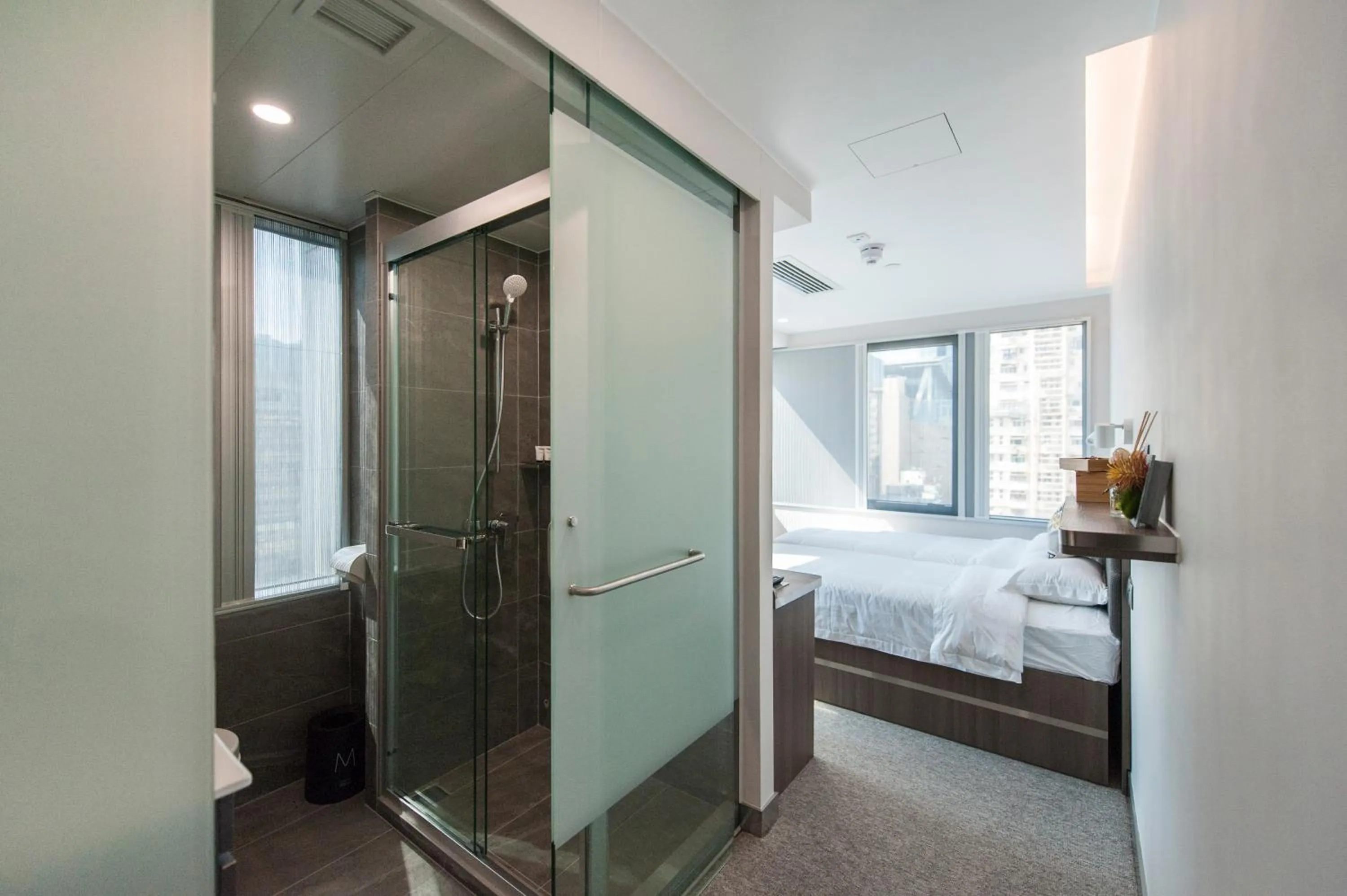 Seating area, Bed in MK STAY - formerly HOTEL MK