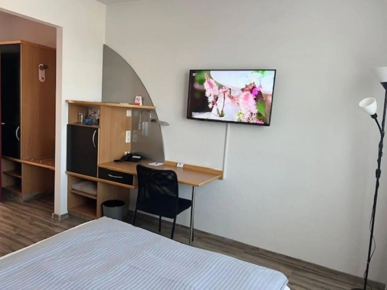 Photo of the whole room, Bed in Hotel KonradP Holzkirchen