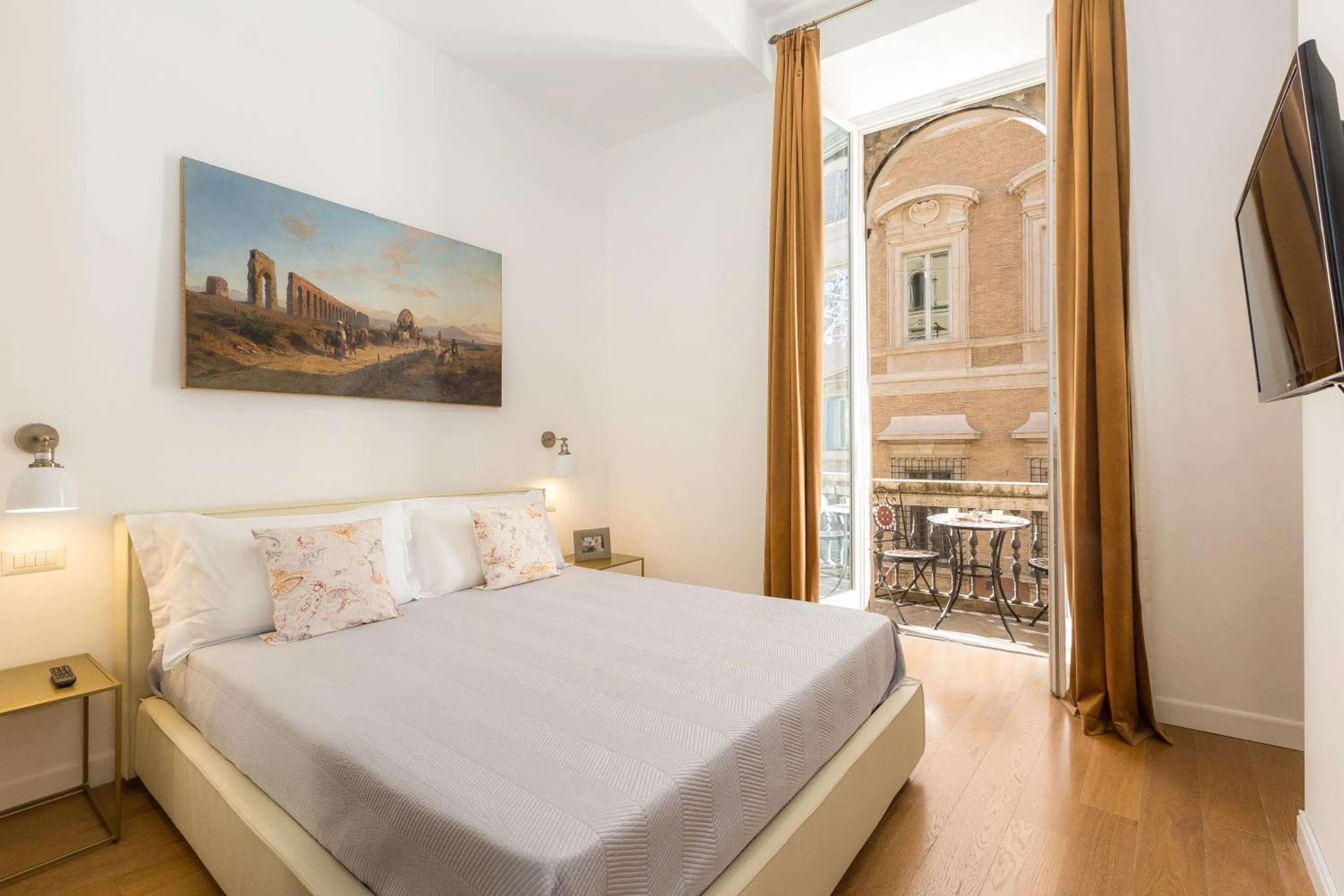 Bed in Amazing Piazza Venezia Suites
