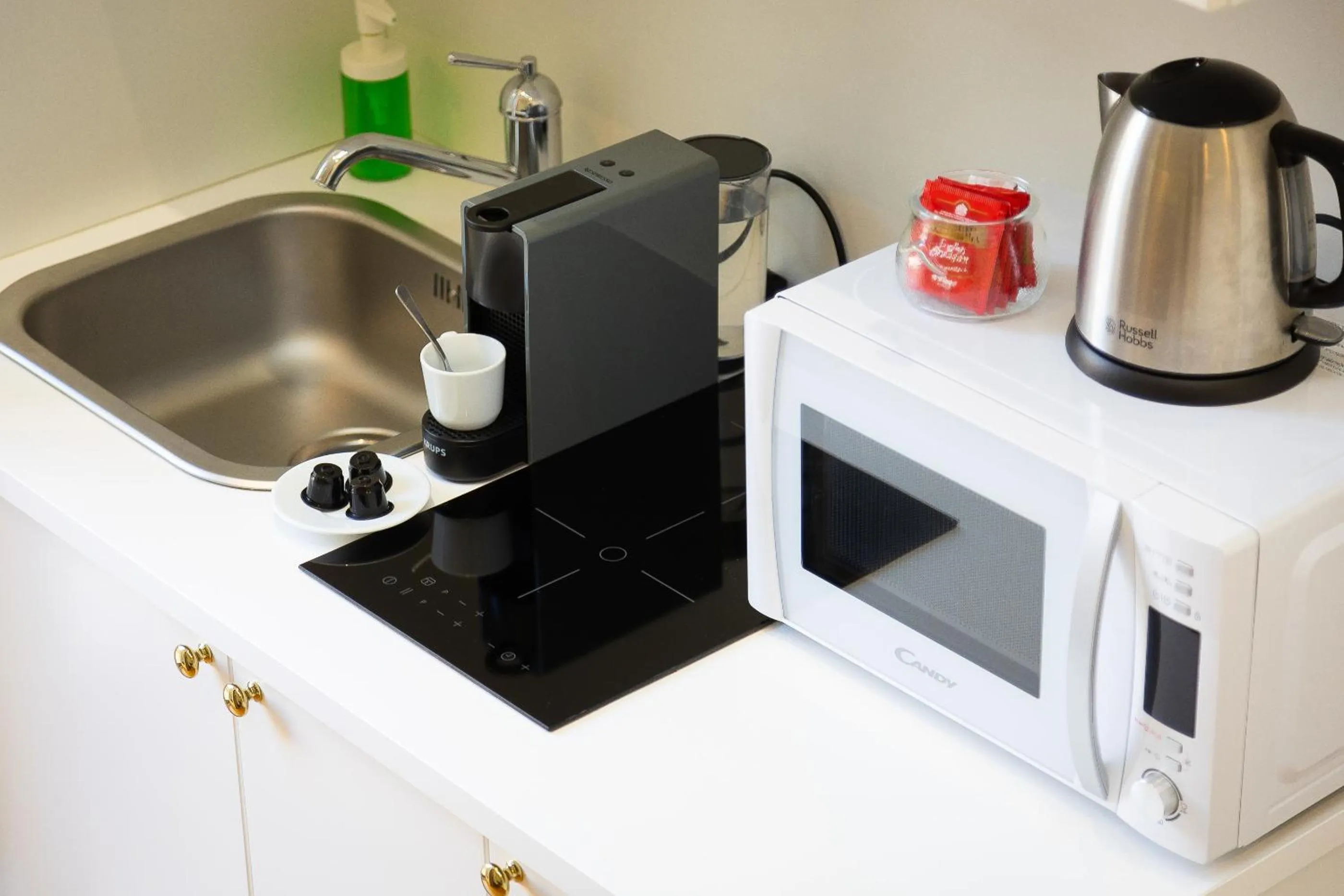 Kitchen or kitchenette in Amazing Piazza Venezia Suites