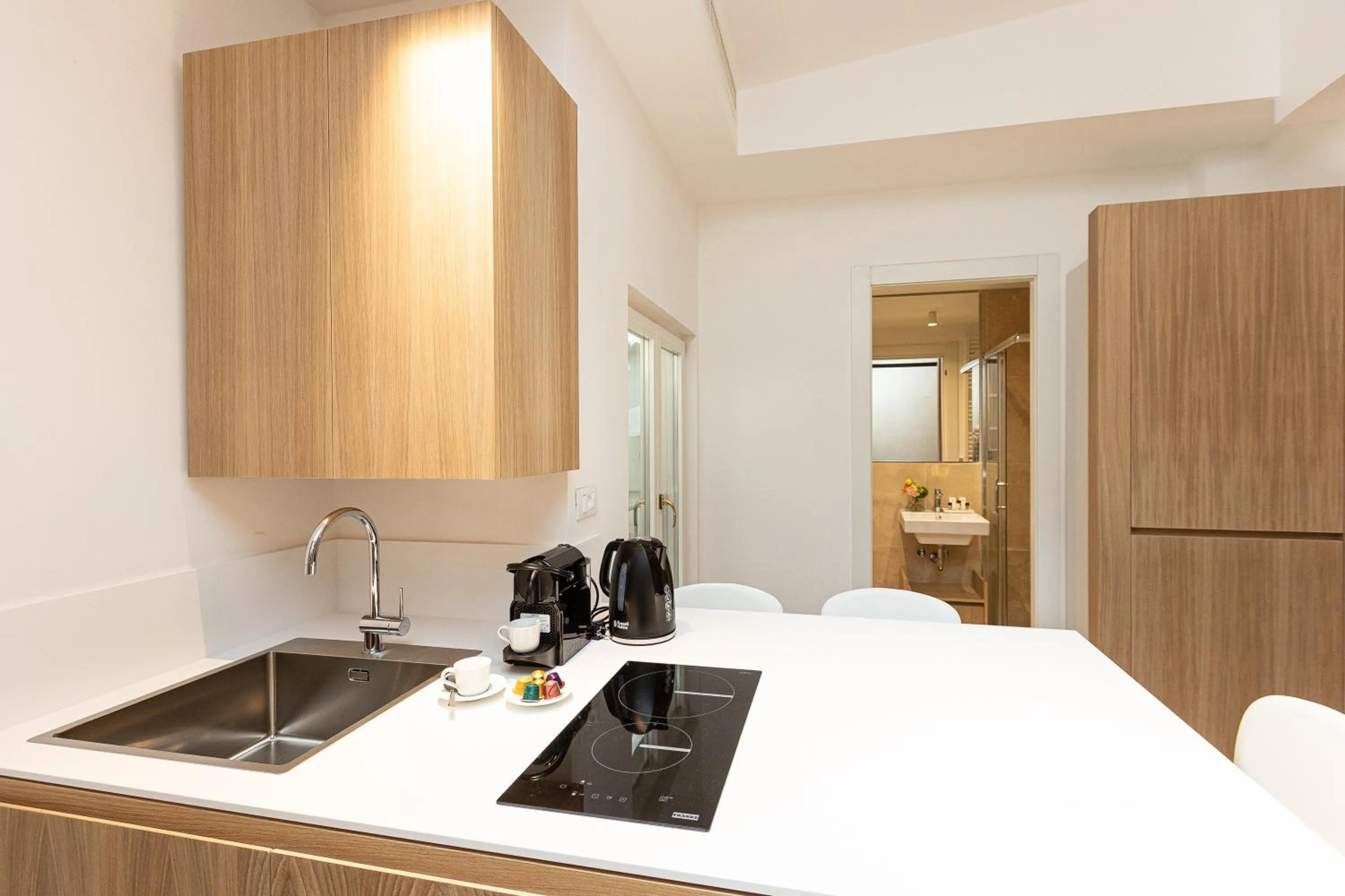 Kitchen or kitchenette in Amazing Piazza Venezia Suites