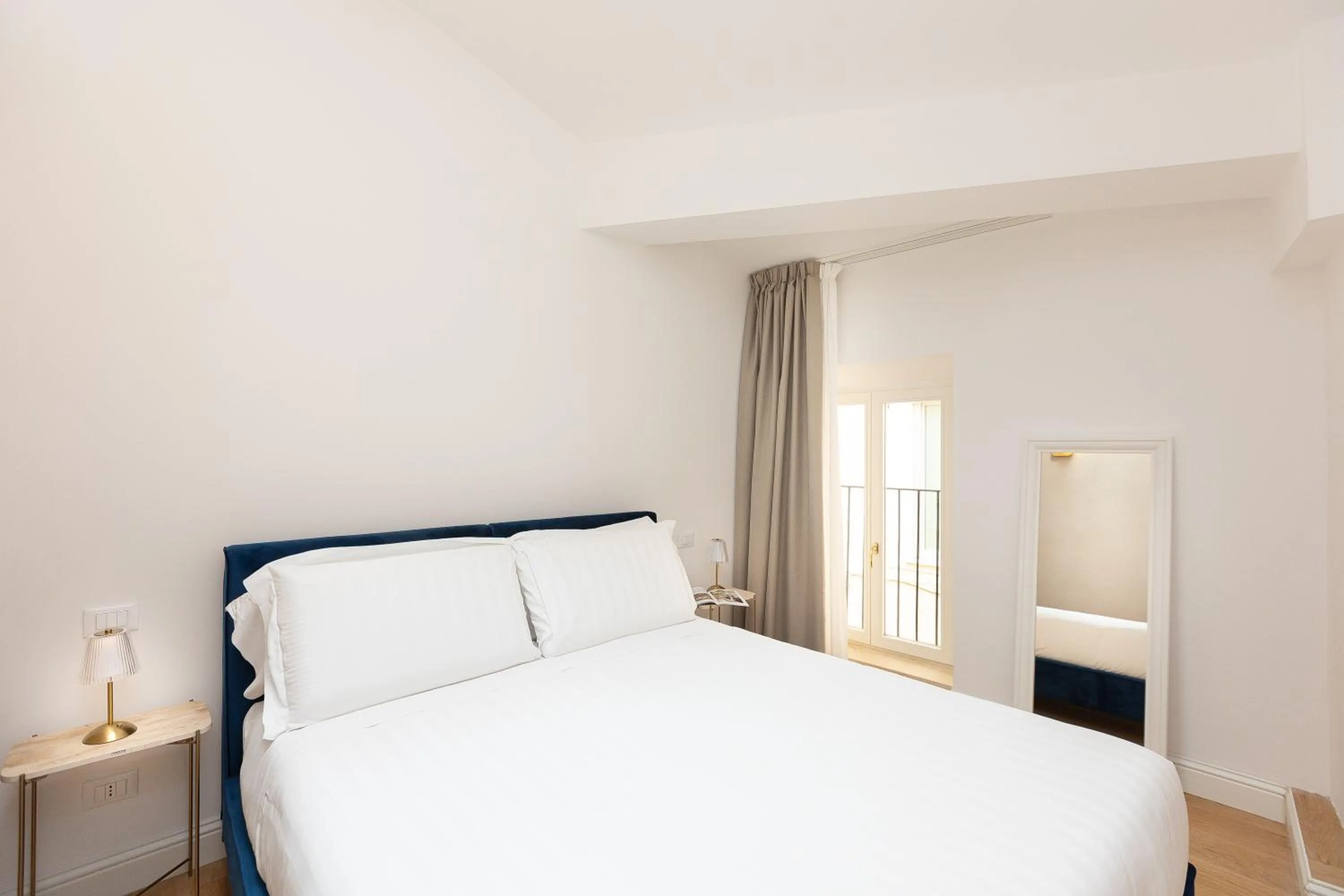 Bed in Amazing Piazza Venezia Suites