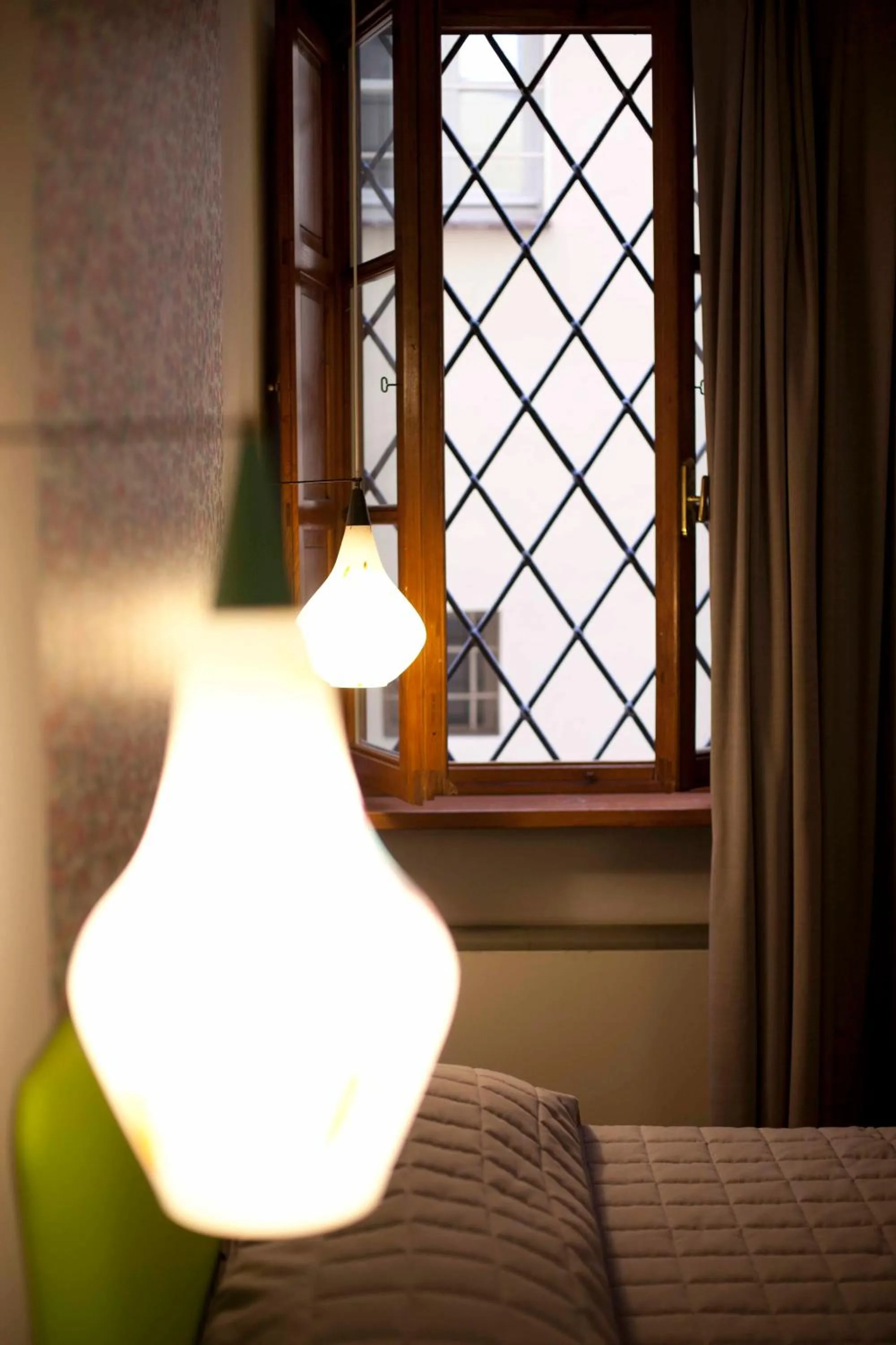 Decorative detail, Bed in Hotel Diana & Depandance