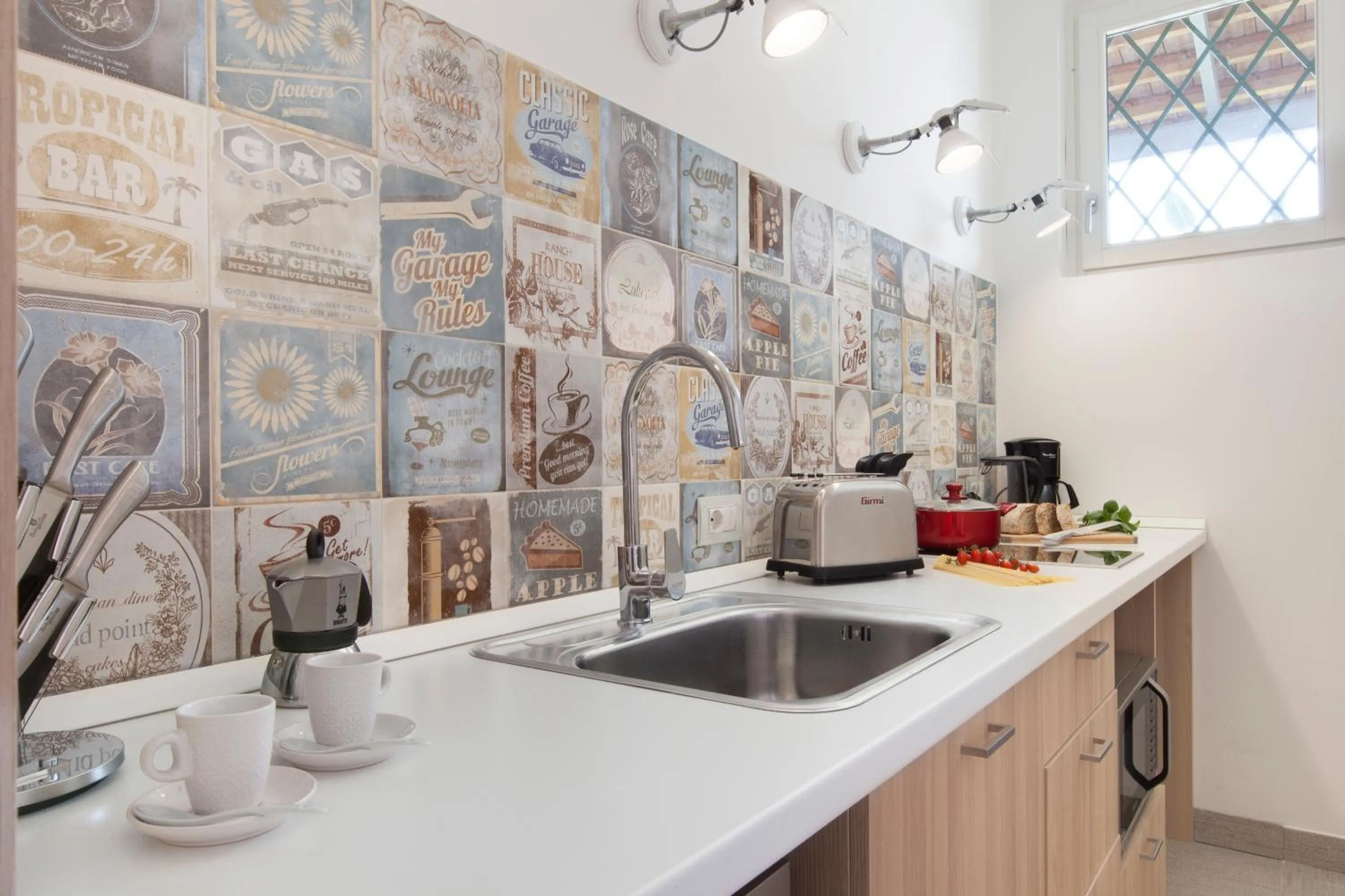Kitchen or kitchenette in Ulisse Apartment