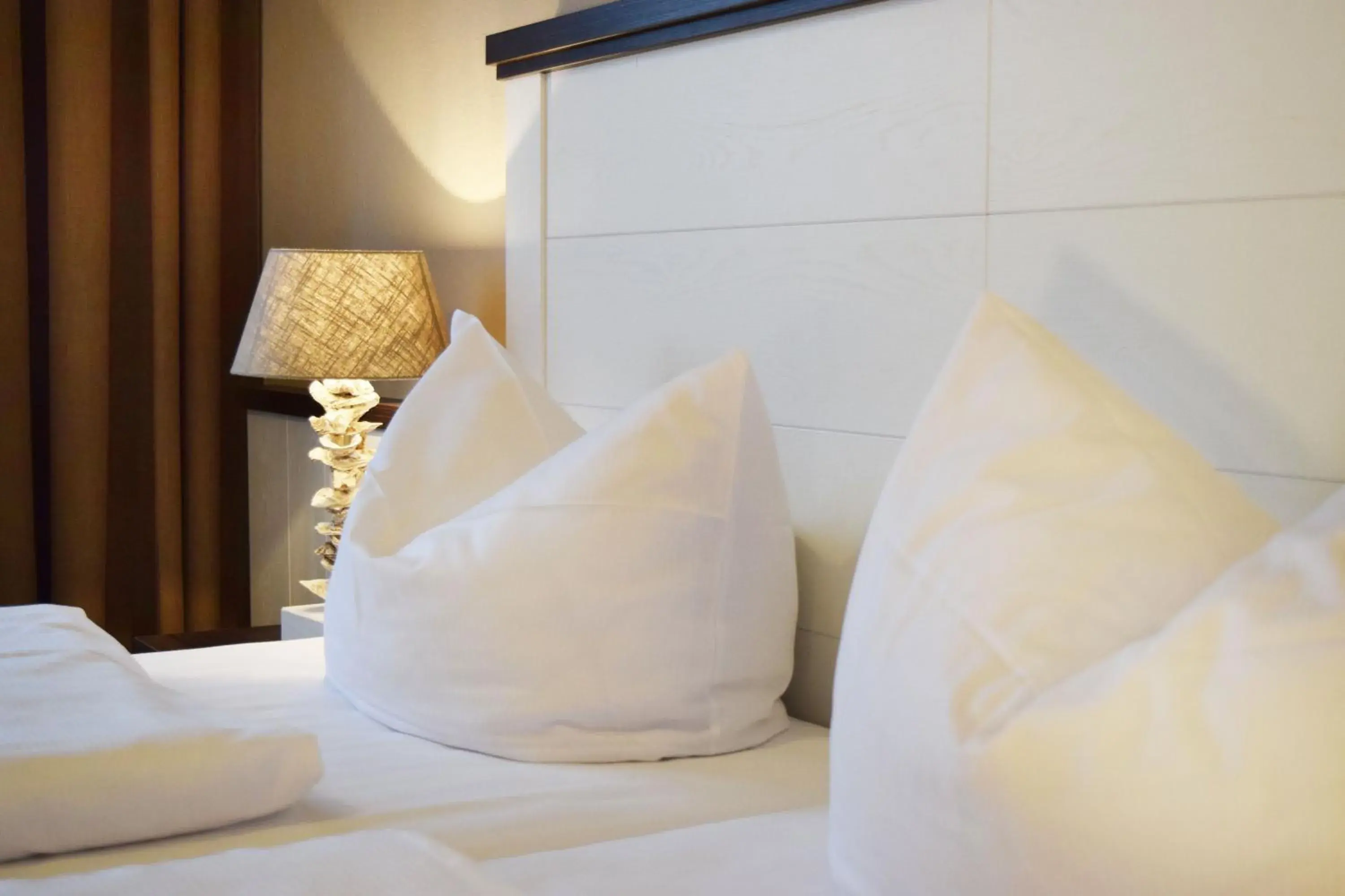 Bed in Hotel Strandschlösschen Bed in Hotel Strandschlösschen